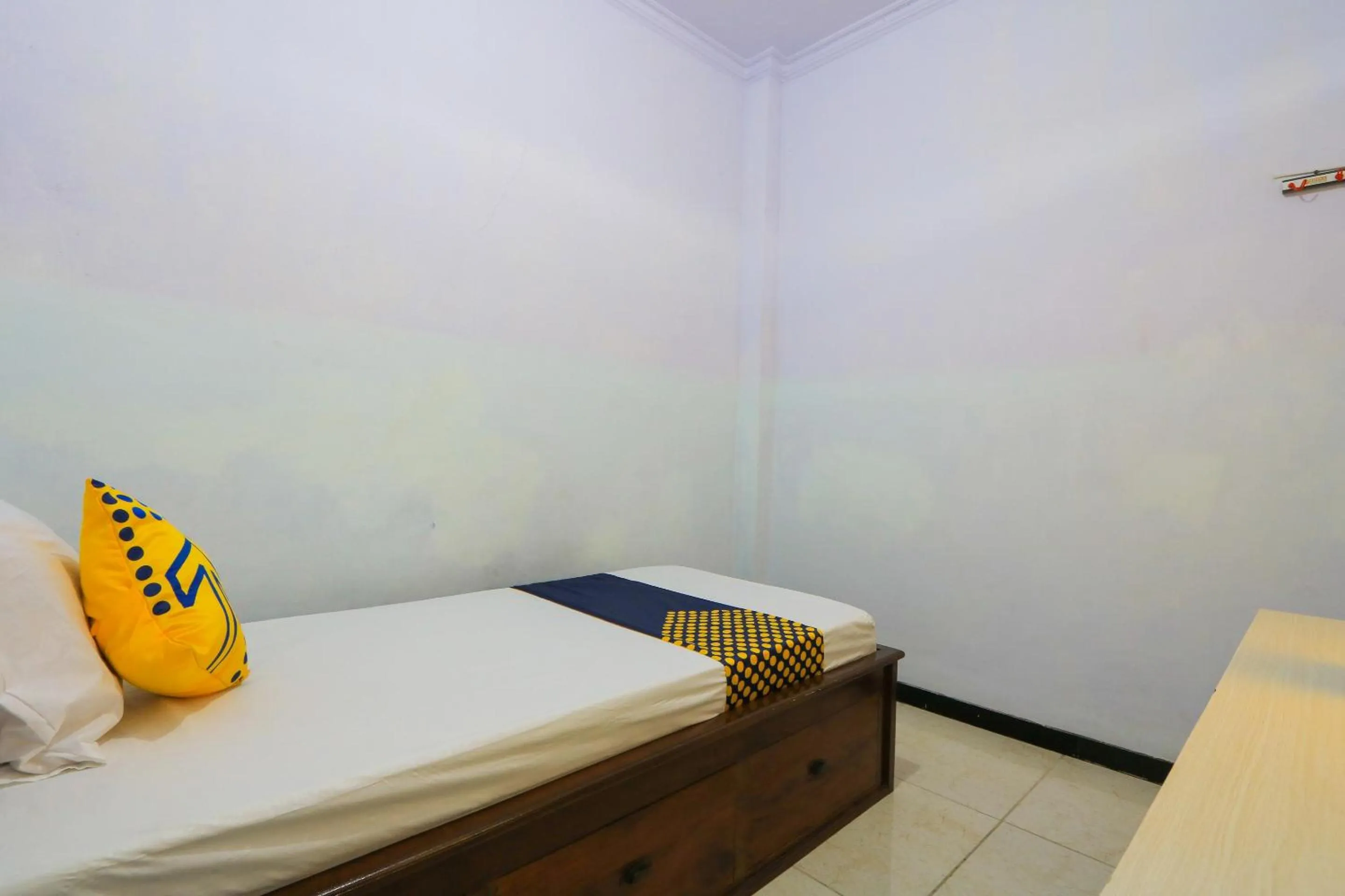 Bedroom in OYO 2497 Pesona Guest House