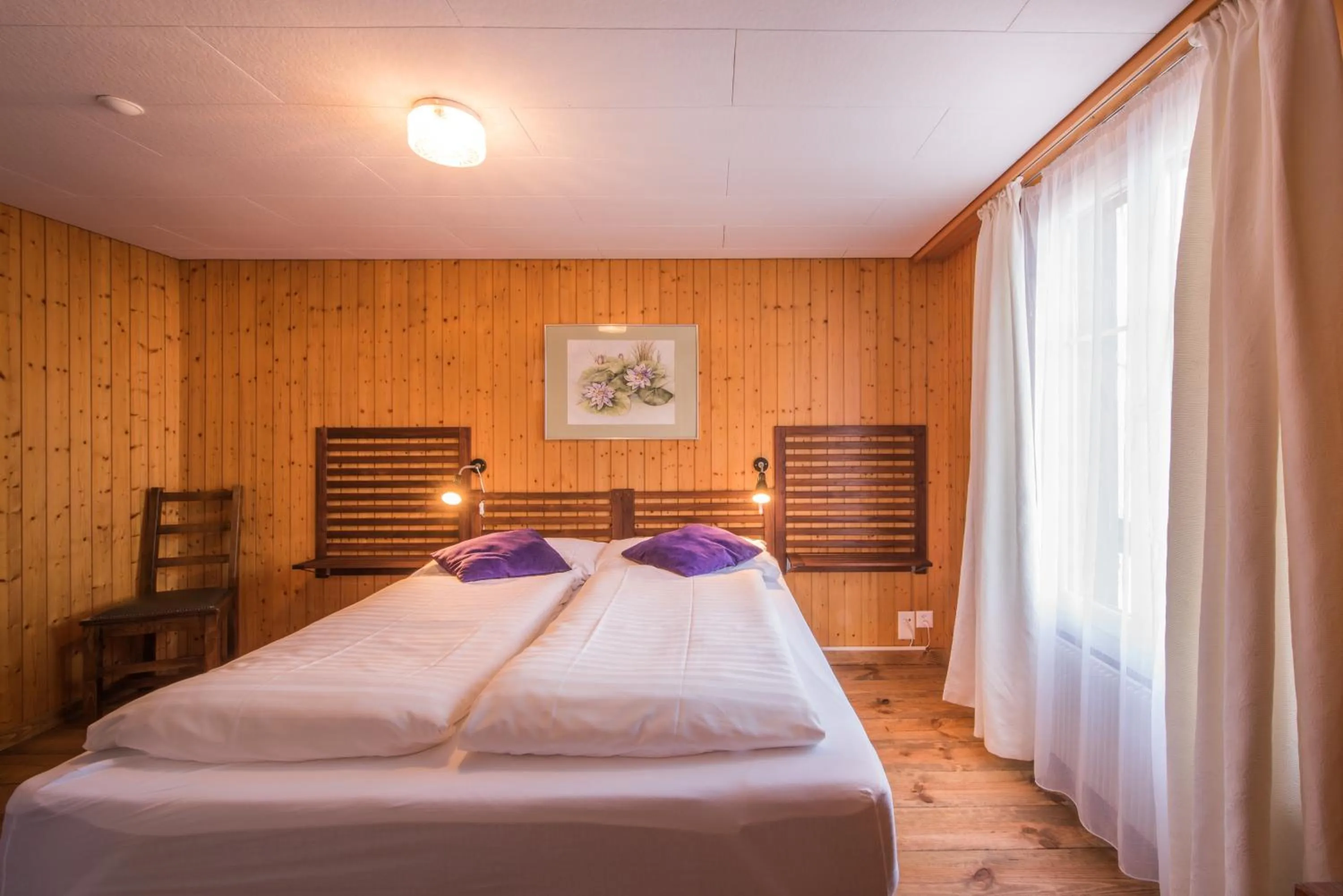 Day, Bed in Hotel Tell and Apartments