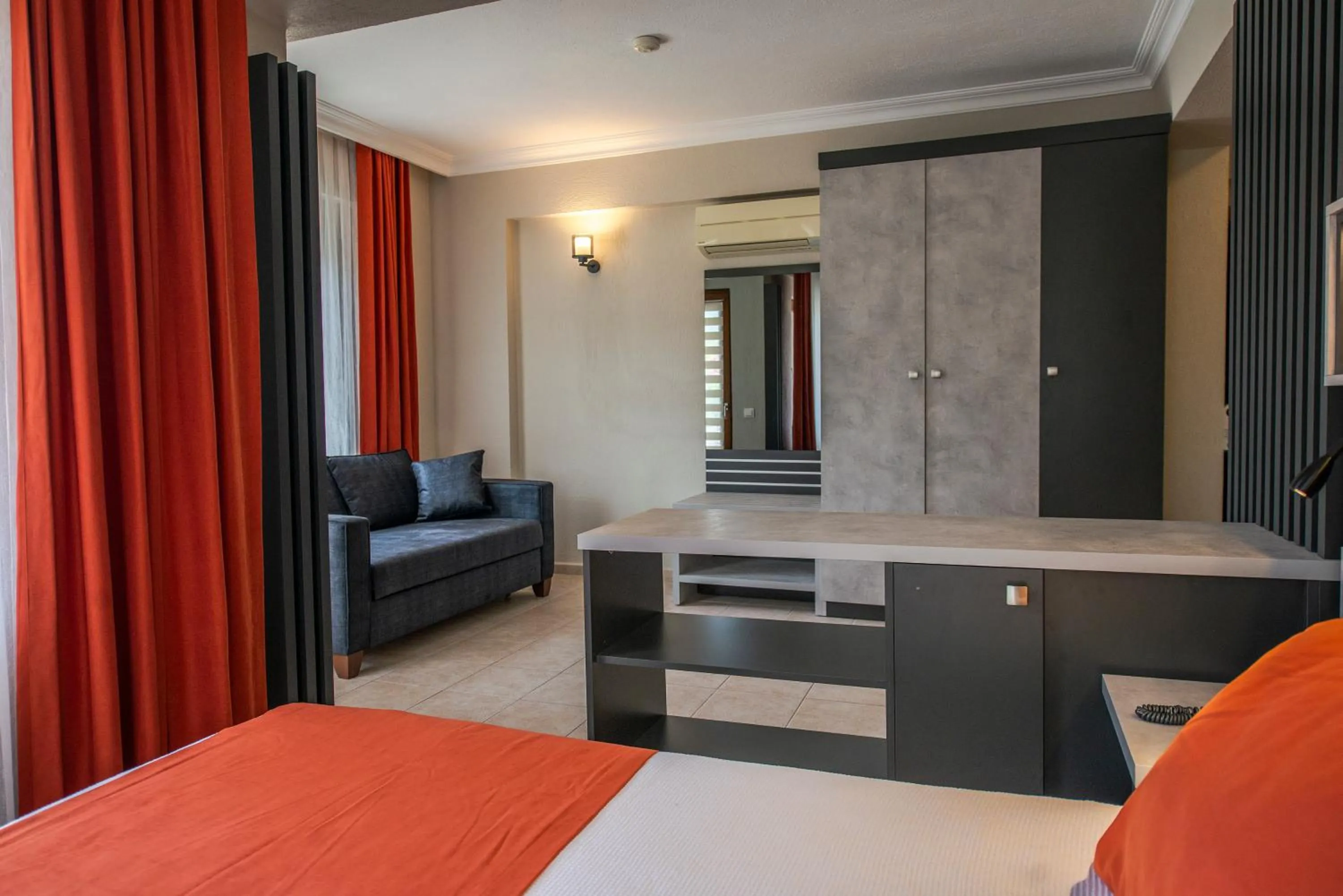 Living room, Bed in Gocek Arion Hotel