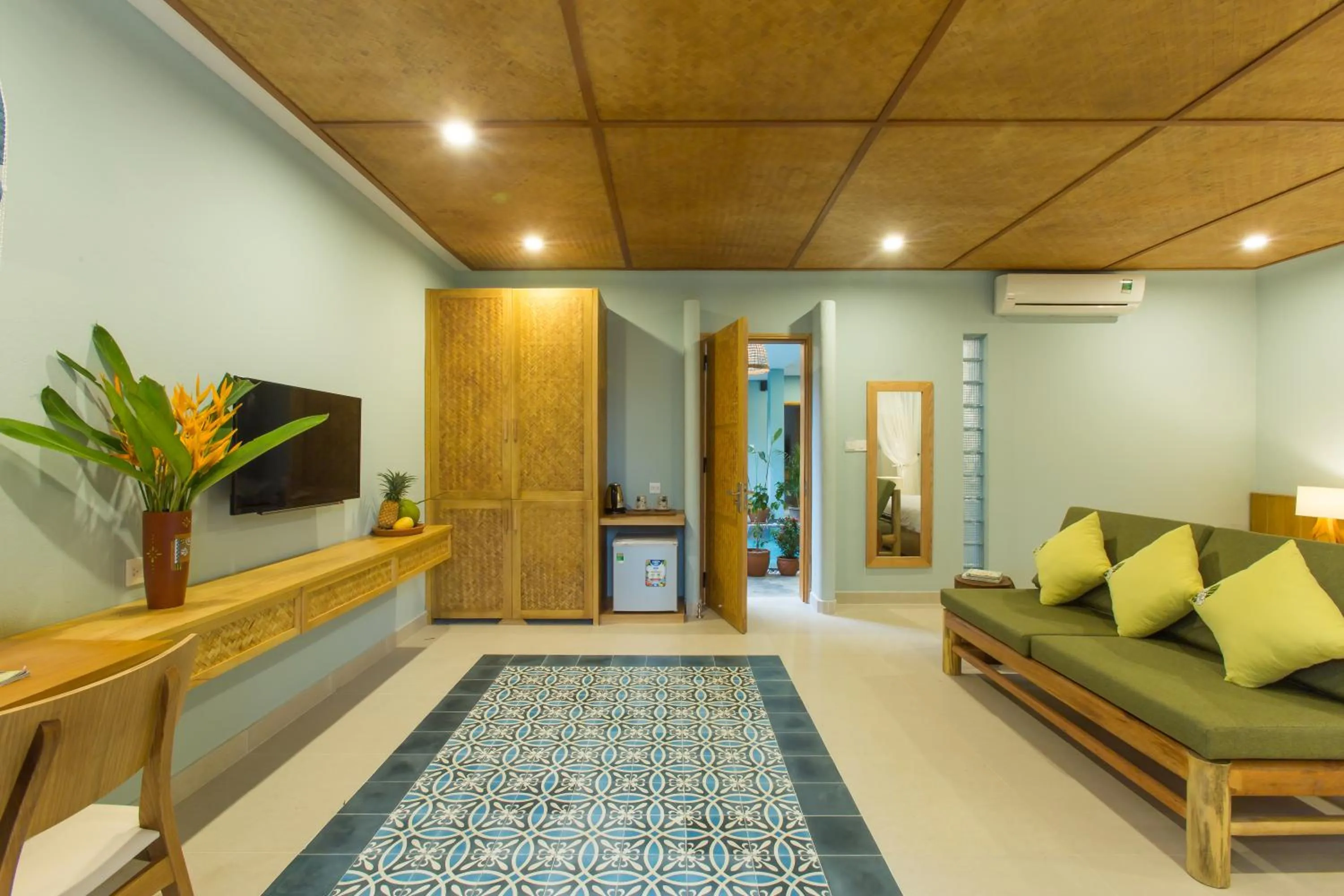 TV and multimedia in Villa De Campagne Hoi An- Boutique homestay with pool and family soul