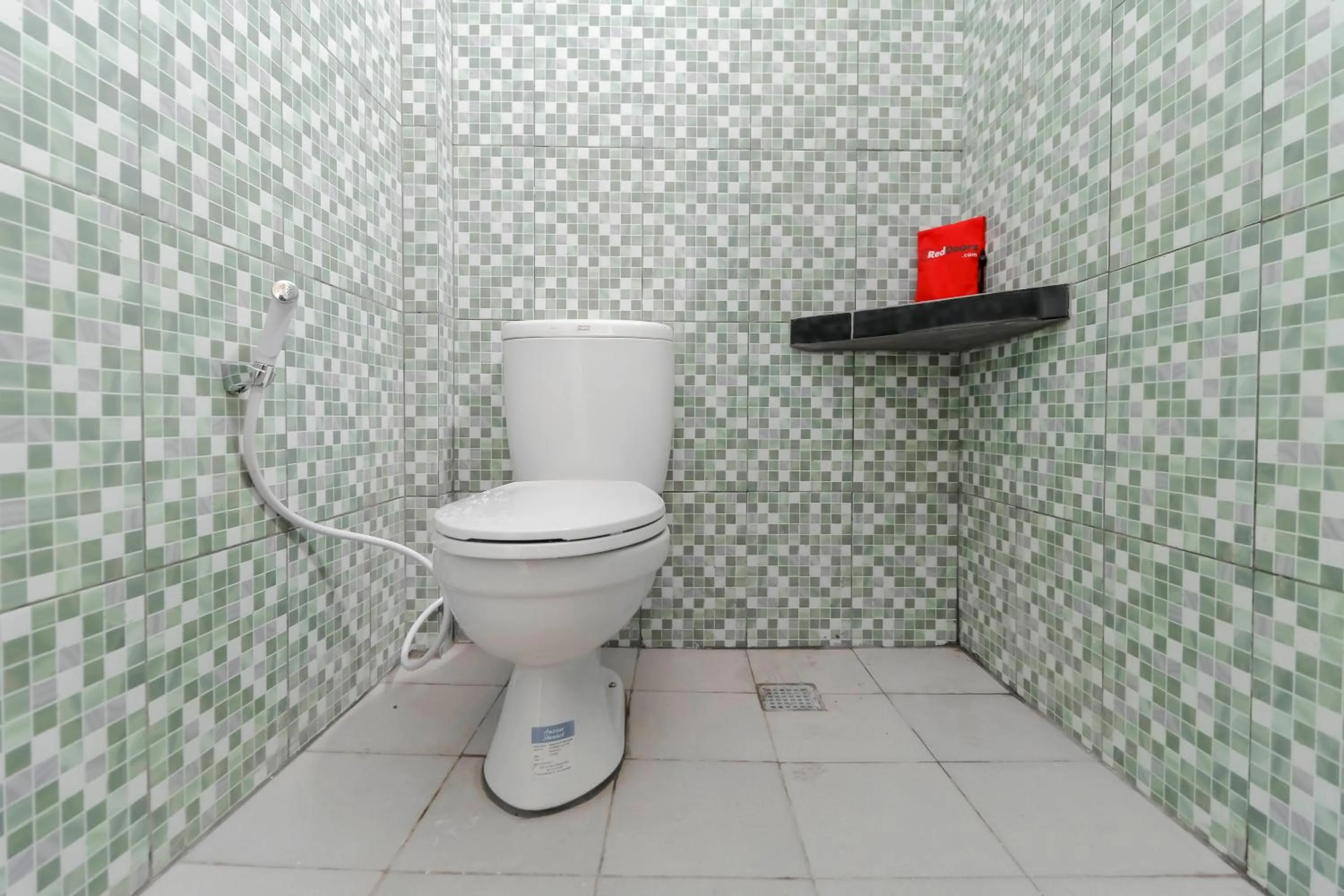Bathroom in RedDoorz Plus near Palembang Square Mall