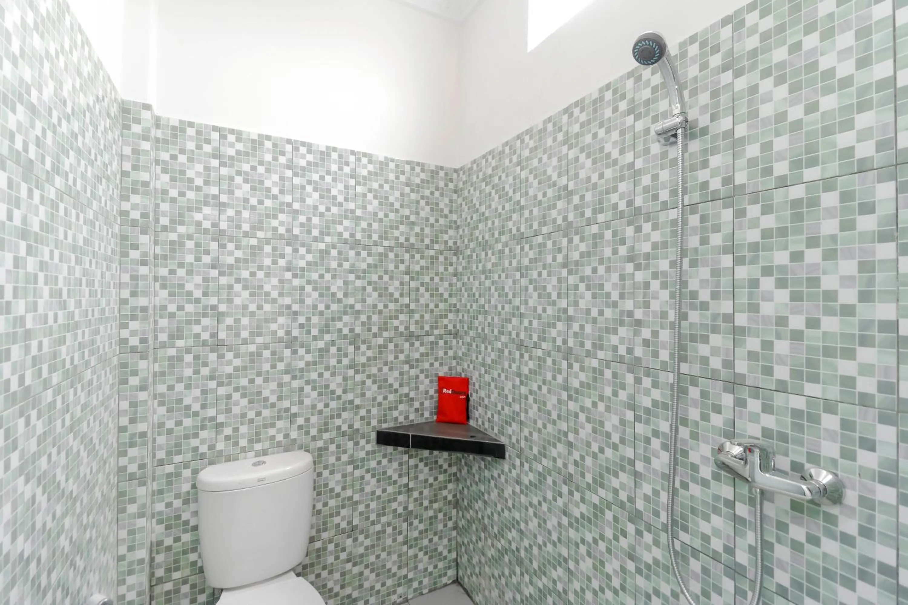 Bathroom in RedDoorz Plus near Palembang Square Mall