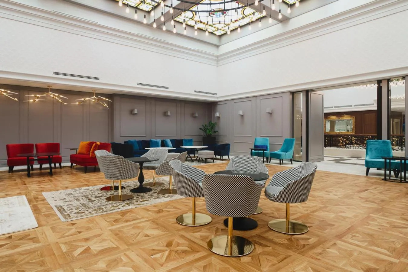 Communal lounge/ TV room in Astor Garden Hotel