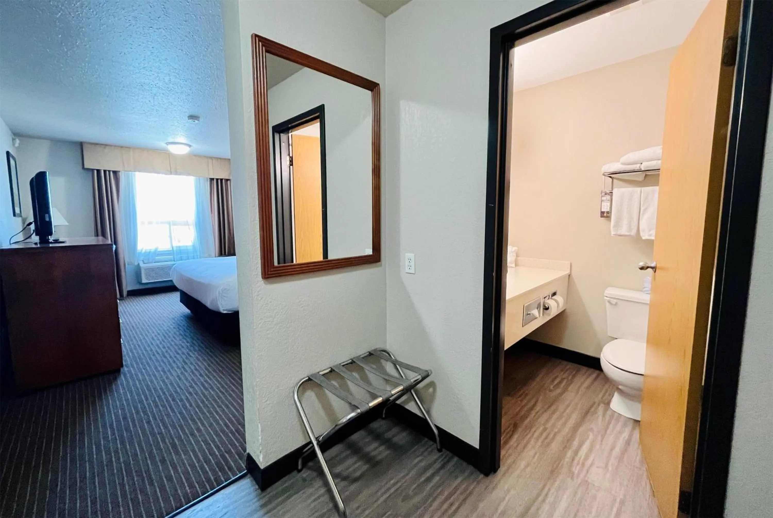 Photo of the whole room, Bed in Super 8 by Wyndham Grande Prairie