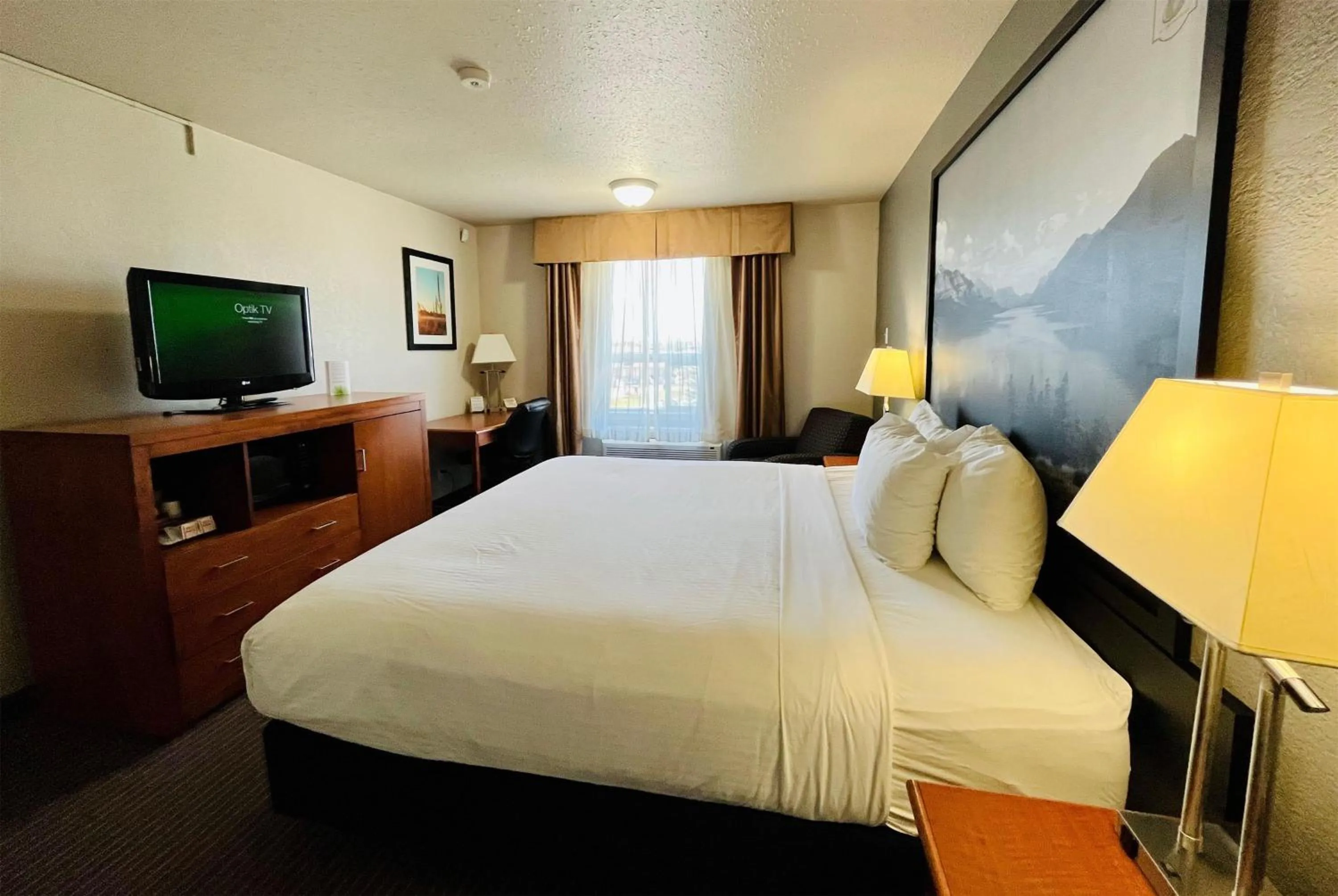 Photo of the whole room, Bed in Super 8 by Wyndham Grande Prairie