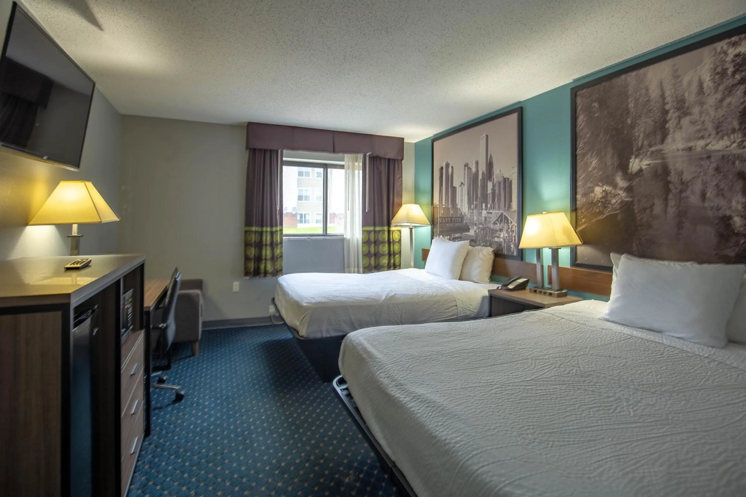 Bed in Super 8 by Wyndham Rockford I-90 Casino District