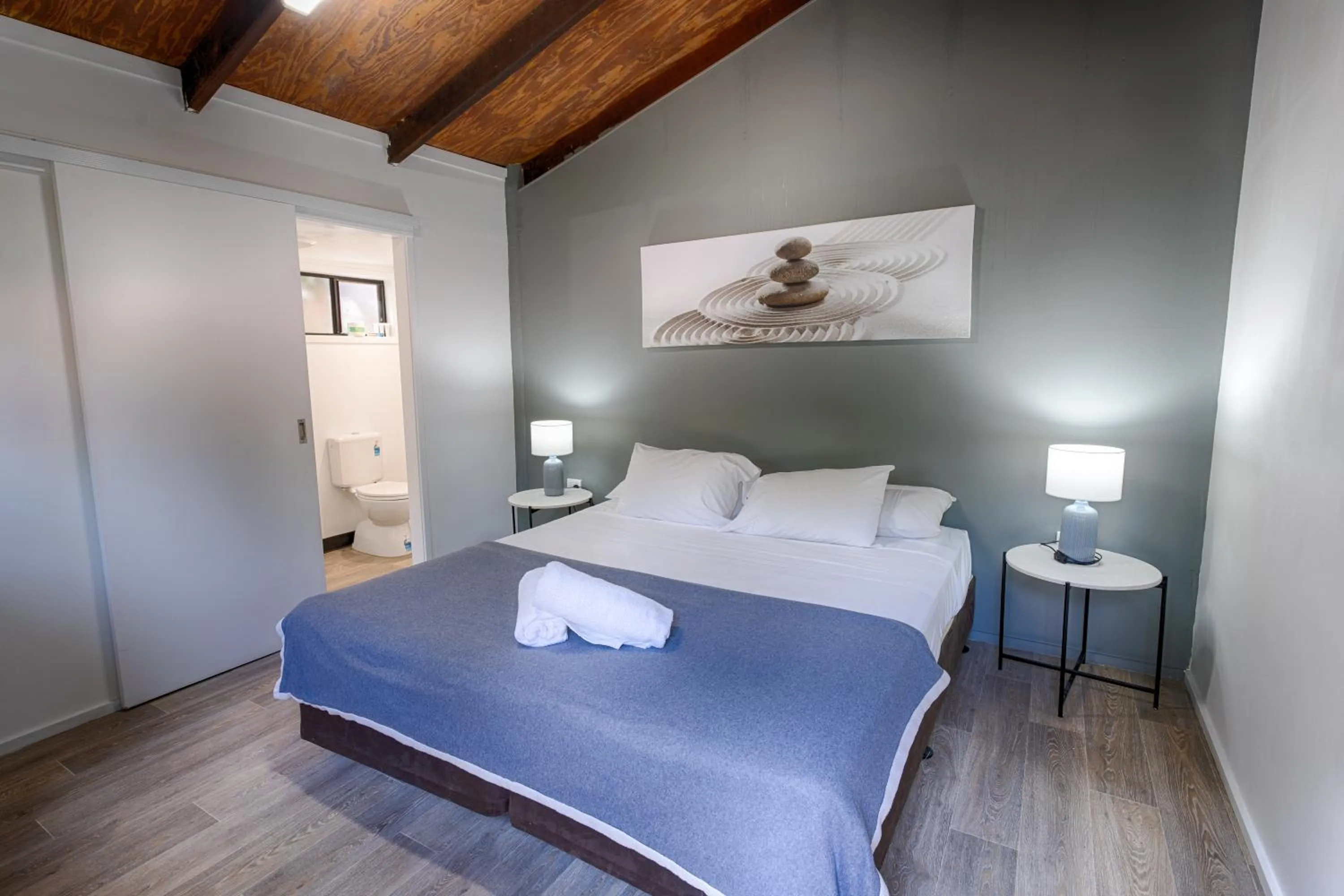 Bathroom, Bed in PK's Jungle Village