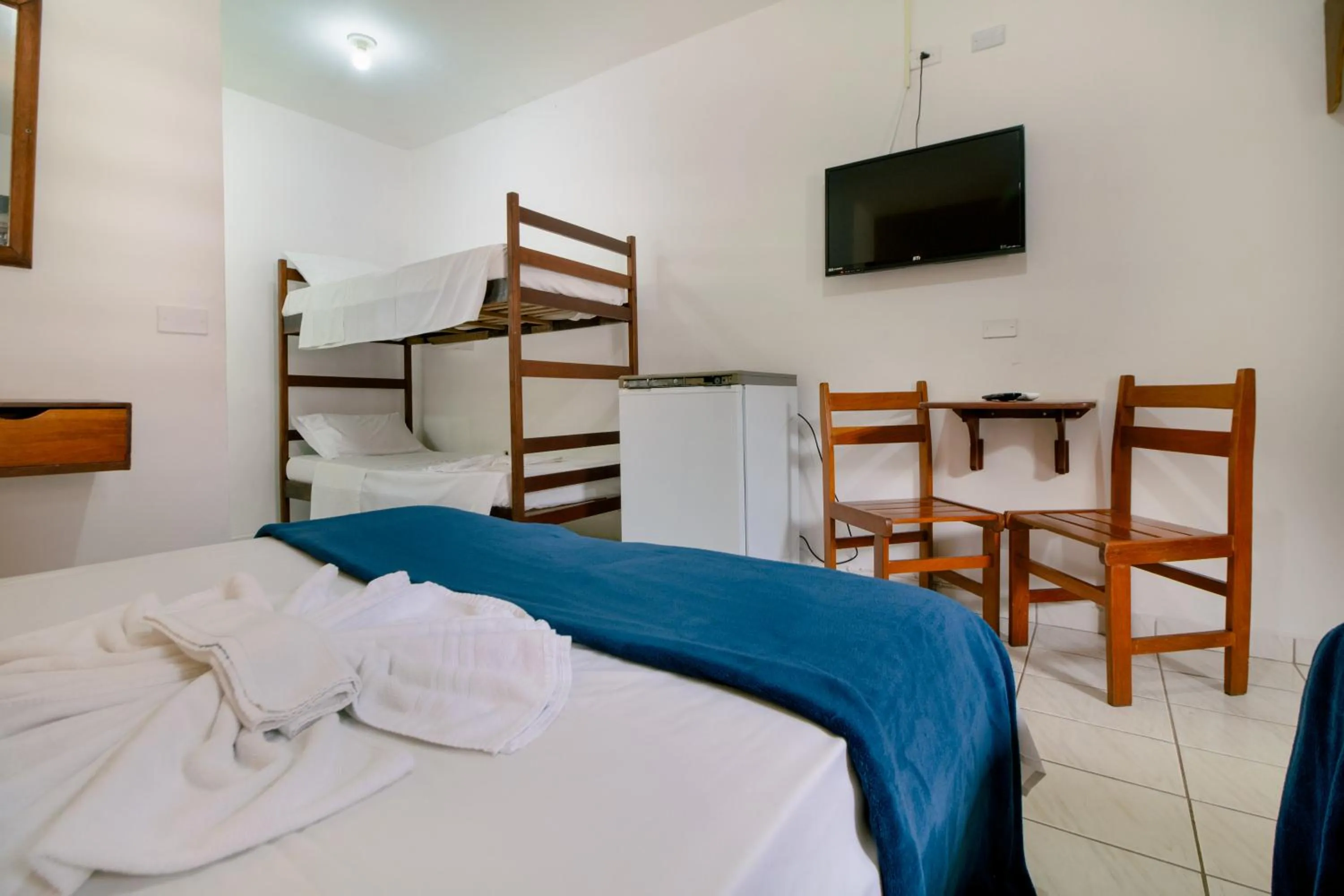 Bed in VELINN Pousada Ubatuba Tropical