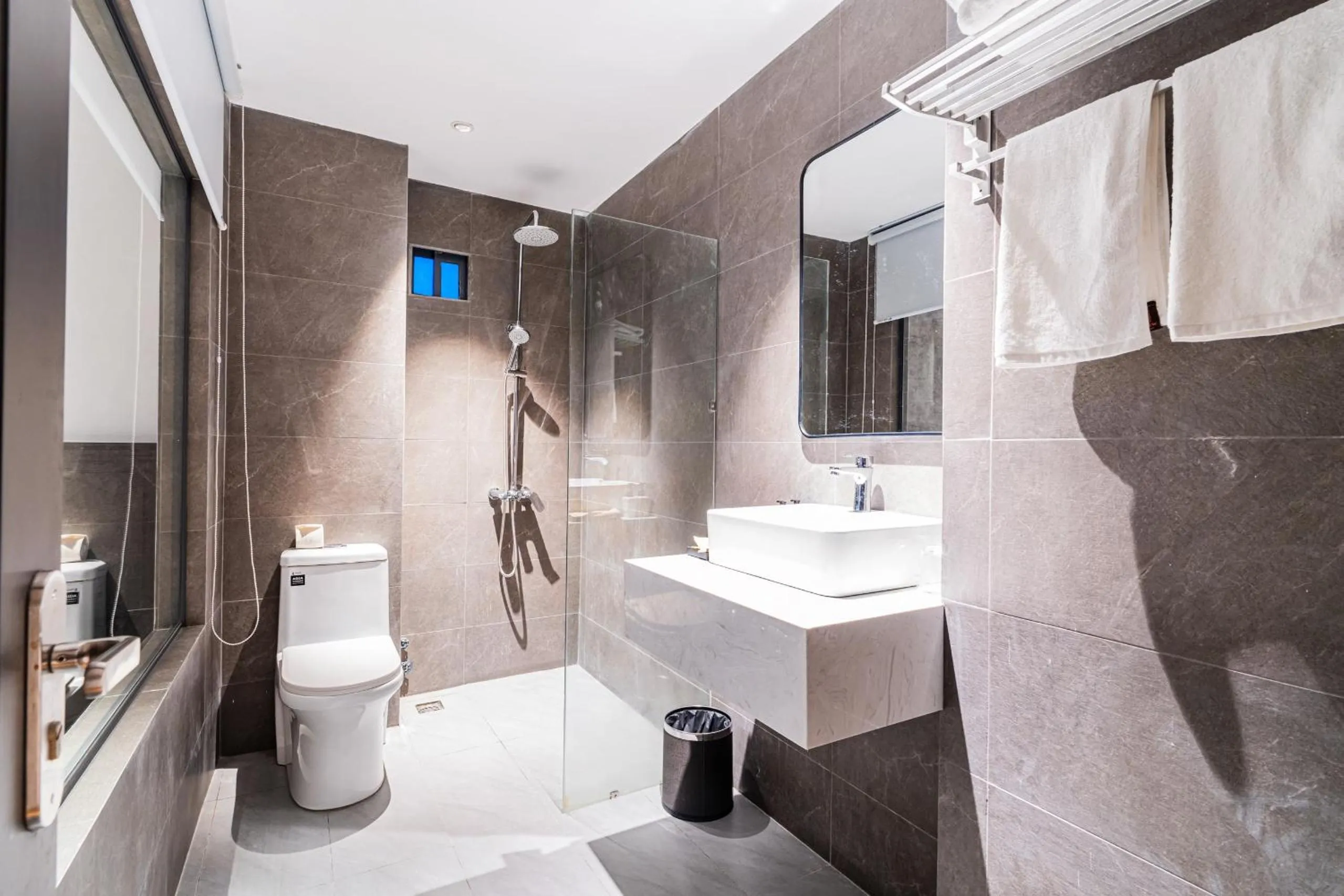 Shower in Cosmo Park Hotel