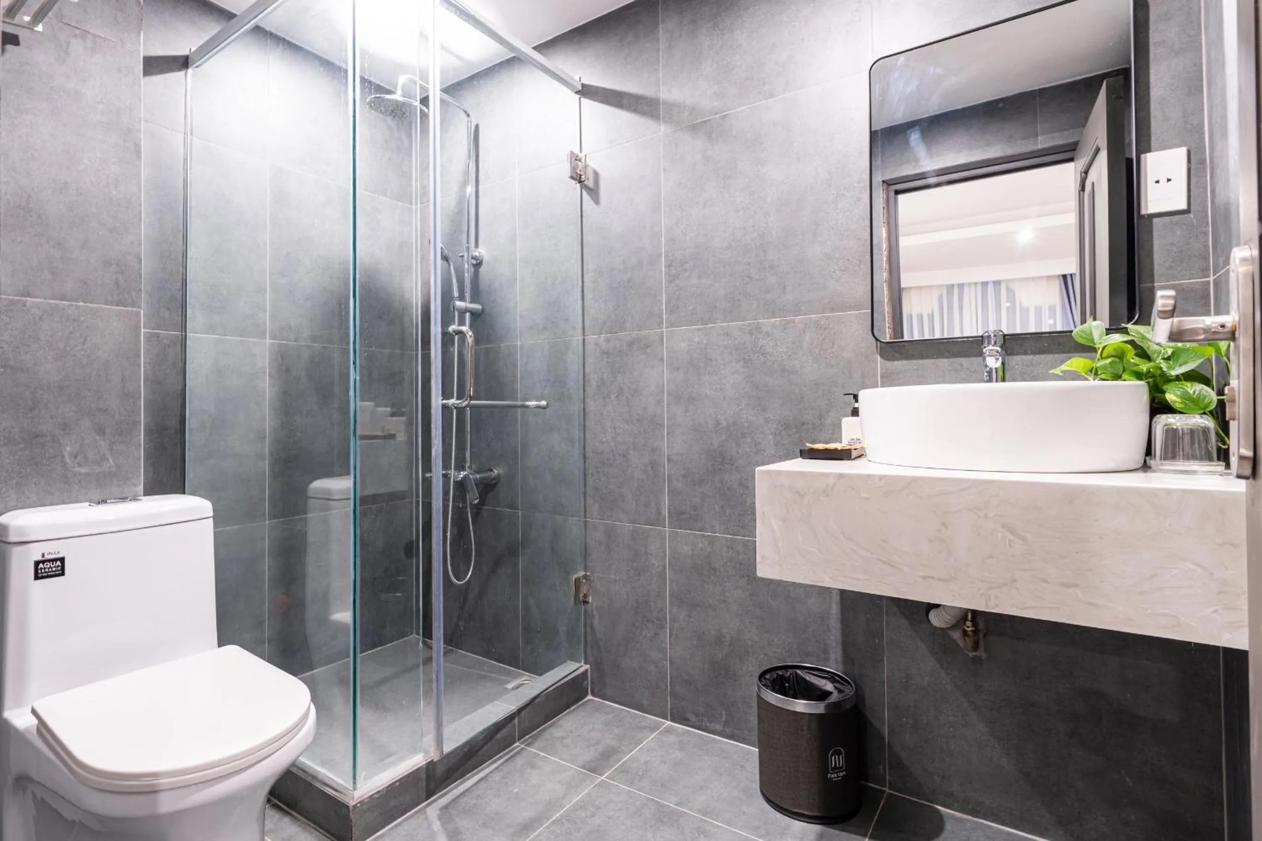 Shower in Cosmo Park Hotel