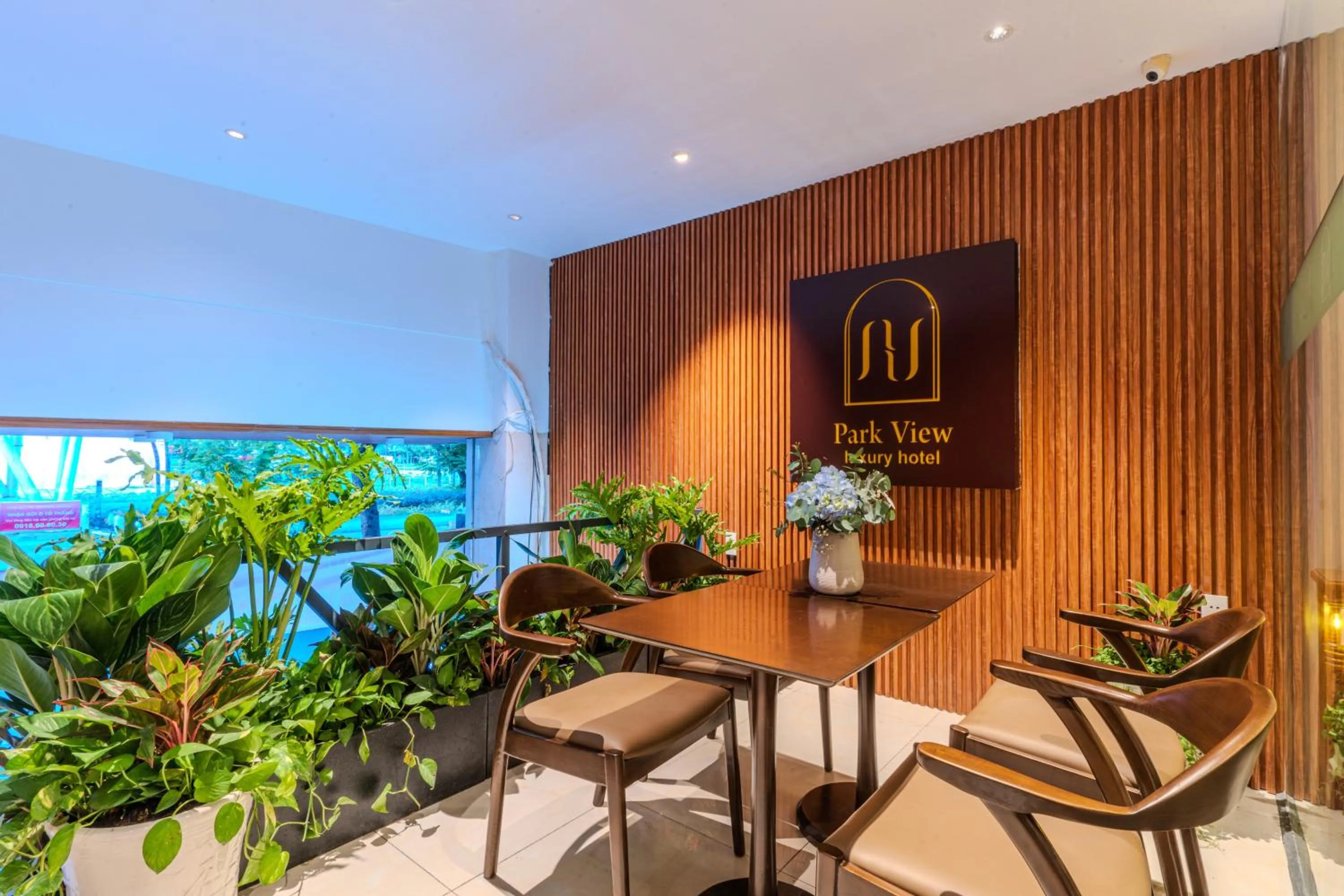 Communal lounge/ TV room in Cosmo Park Hotel