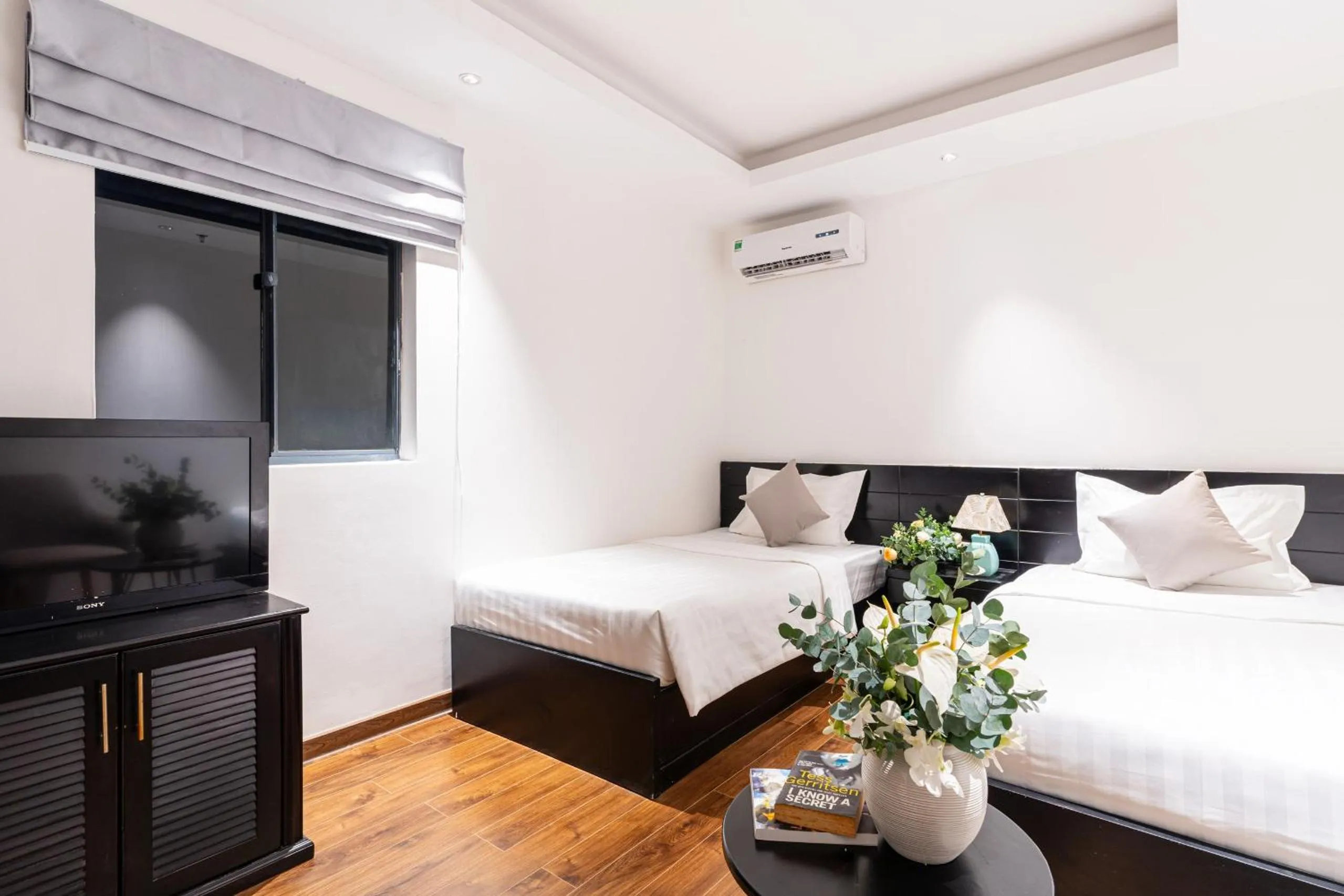 Bed in Cosmo Park Hotel