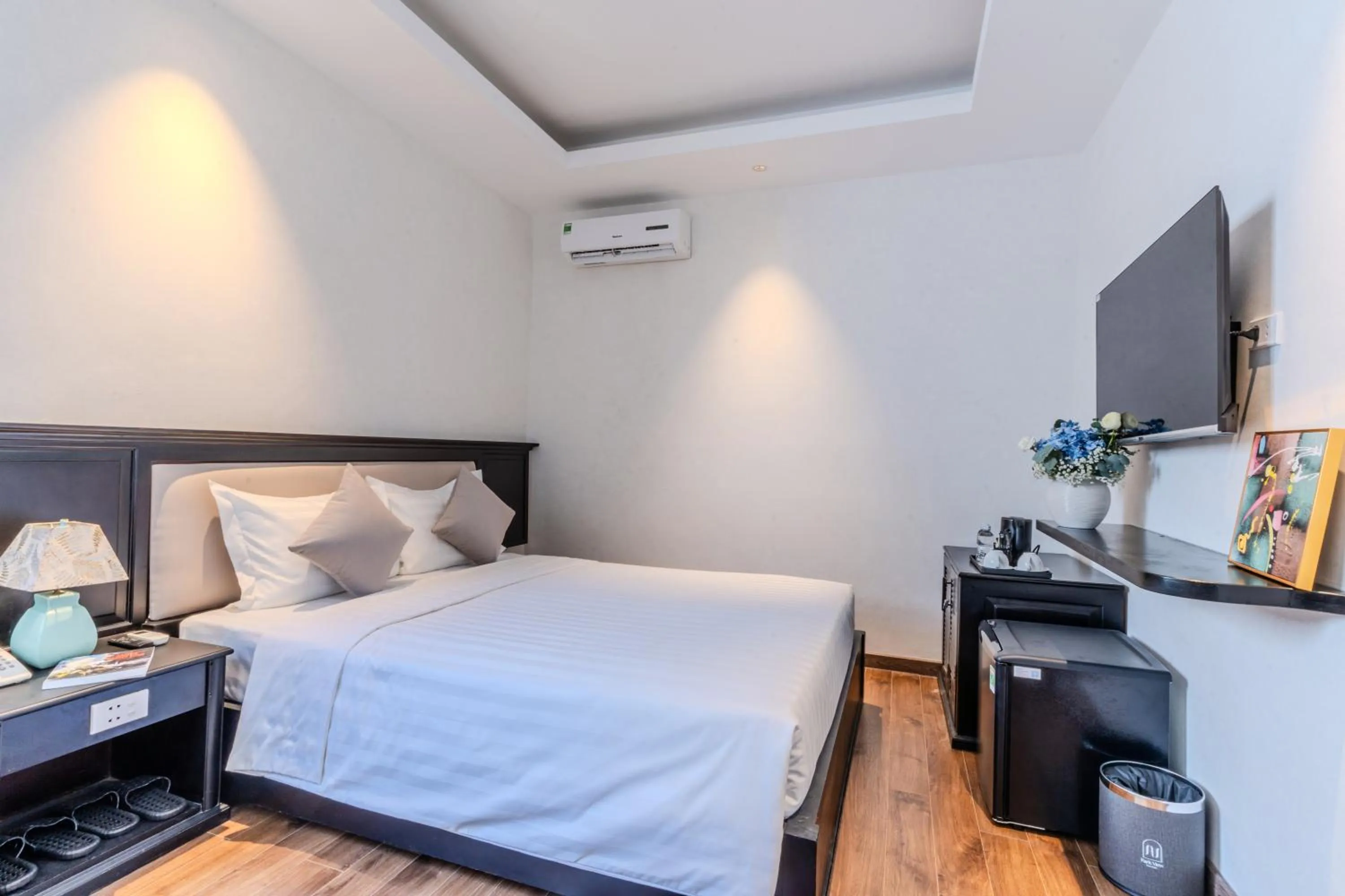 Bed in Cosmo Park Hotel