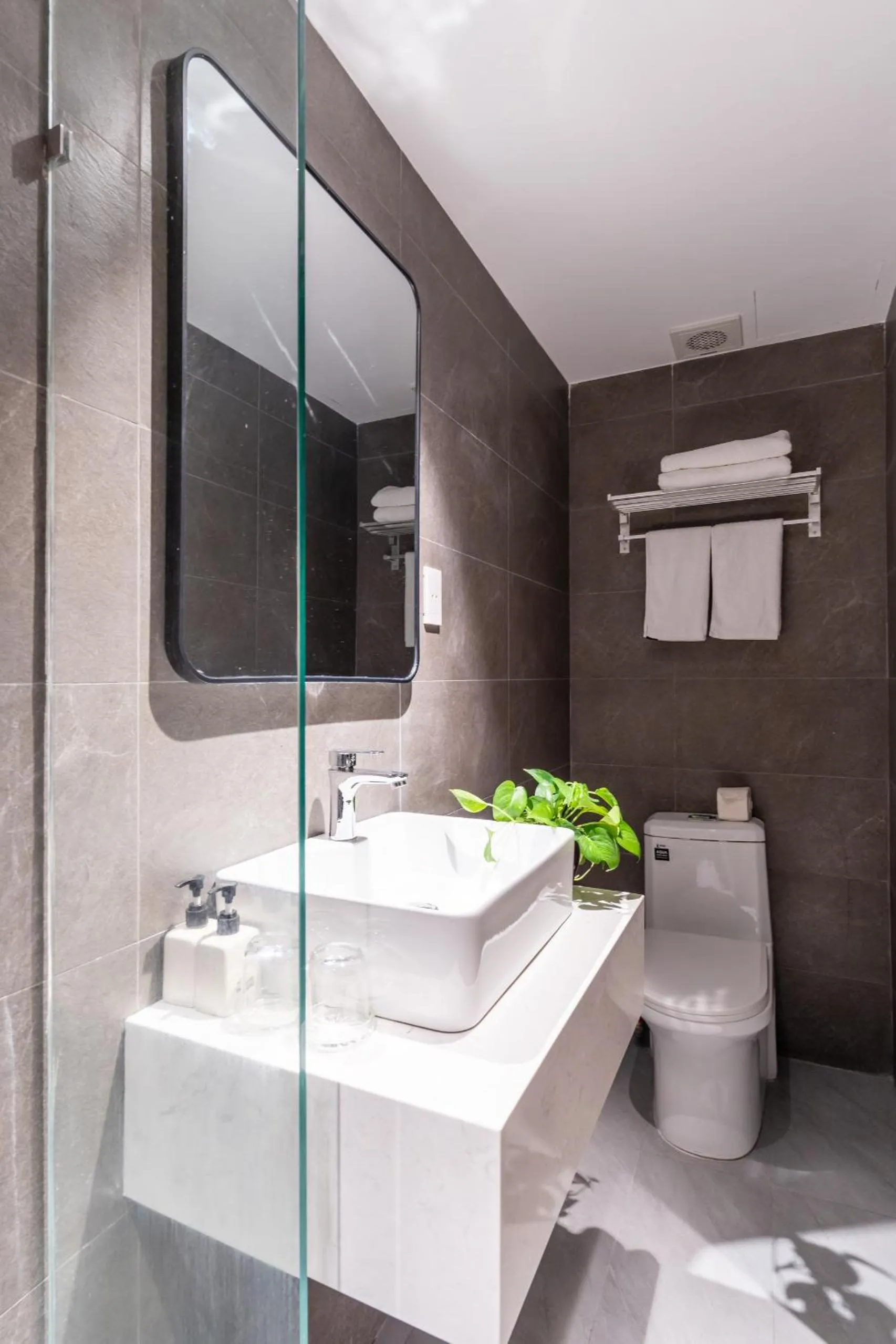 Shower in Cosmo Park Hotel