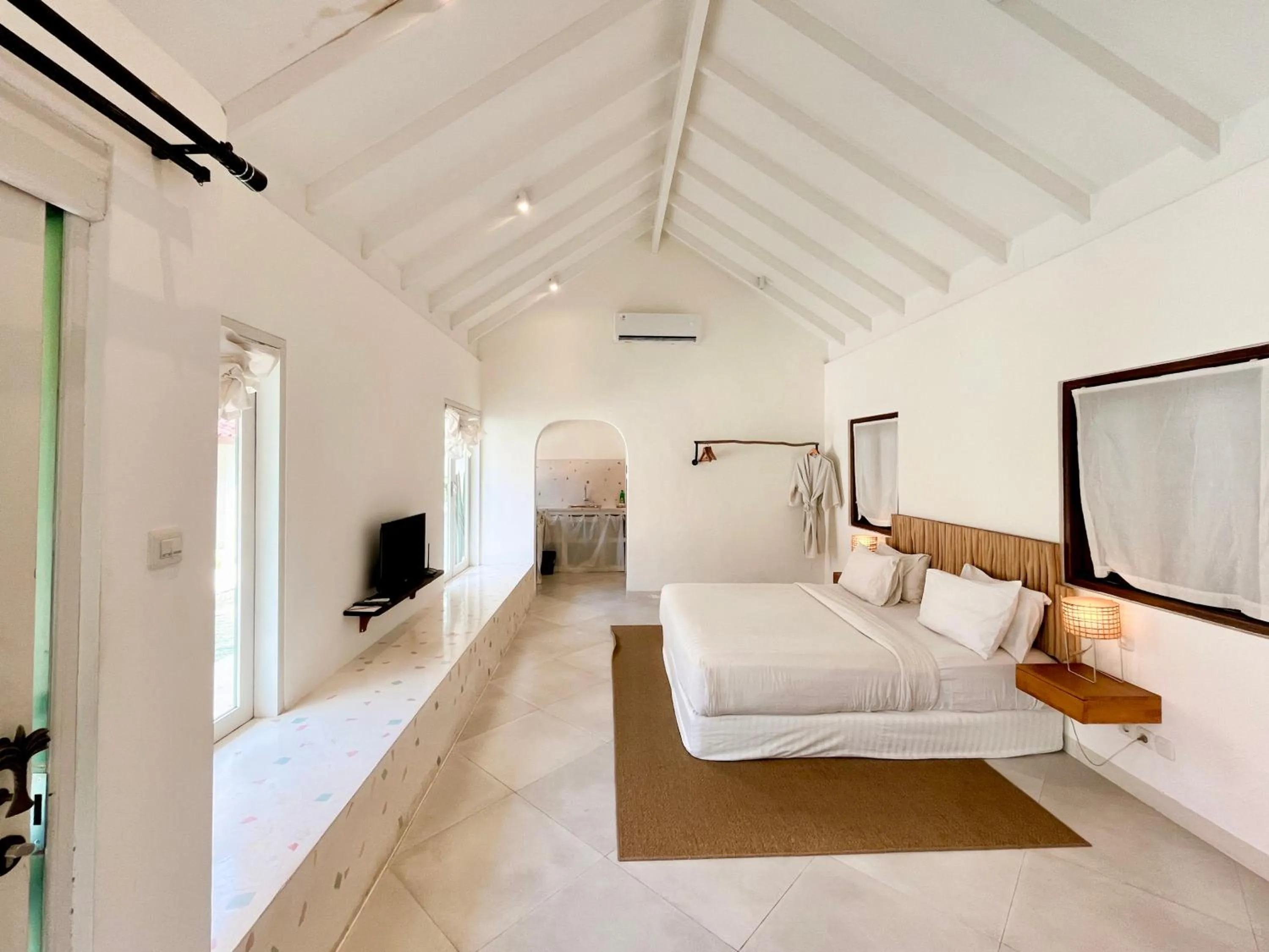 Bed in Happy Together By Kresna Hospitality