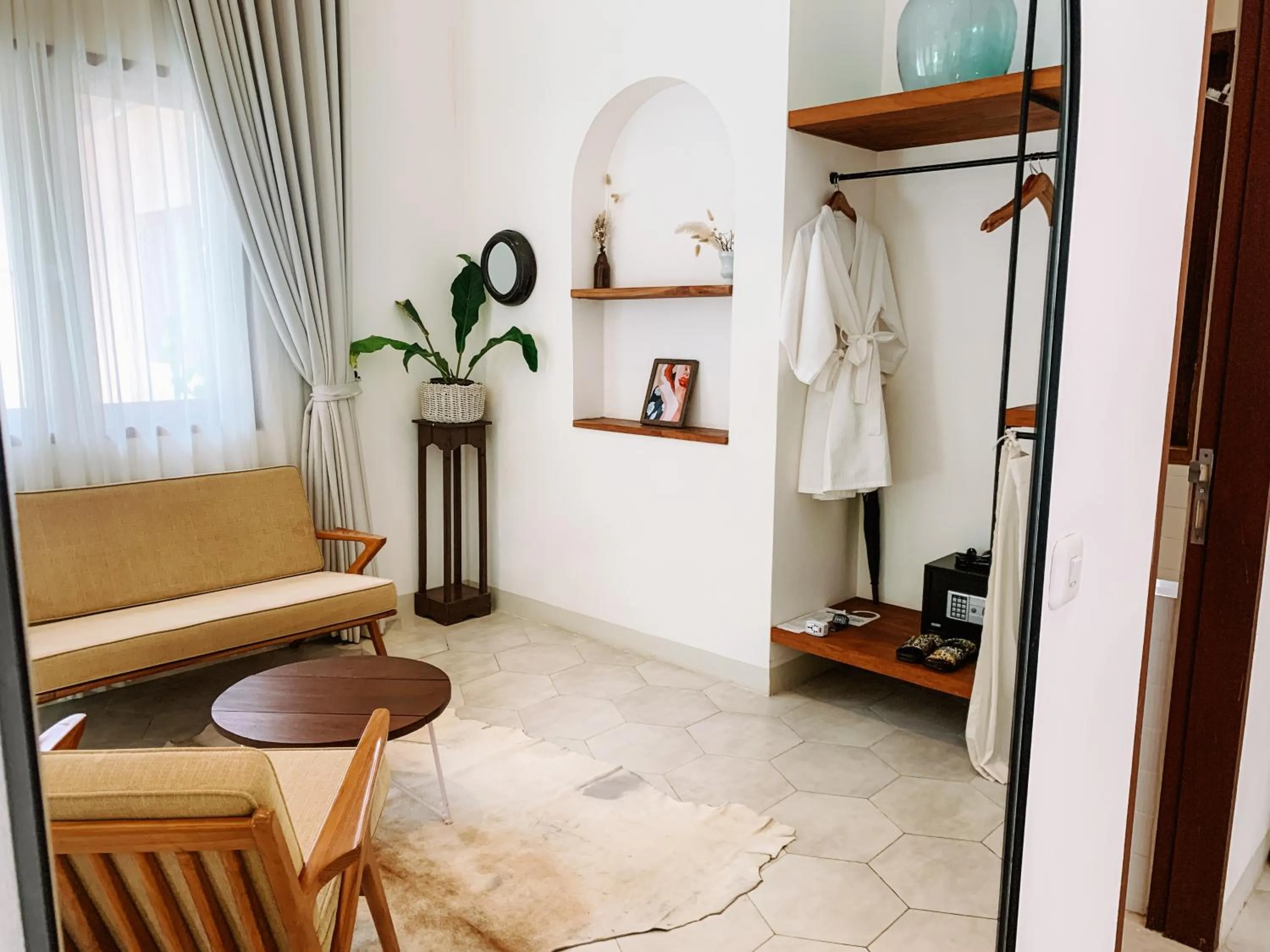 Seating area in Happy Together By Kresna Hospitality