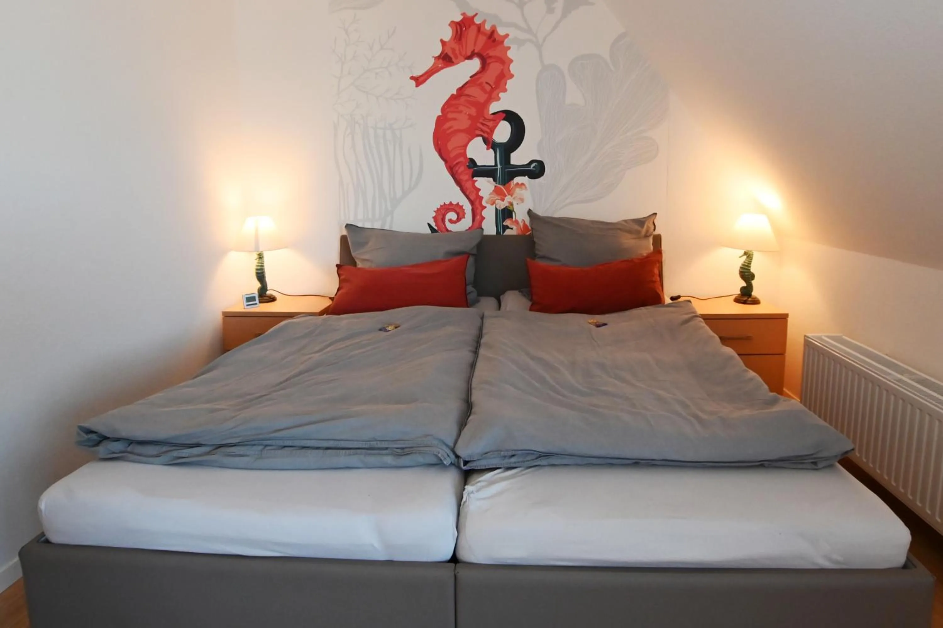 Living room, Bed in Ferienwohnung NORDIA Allee und See
