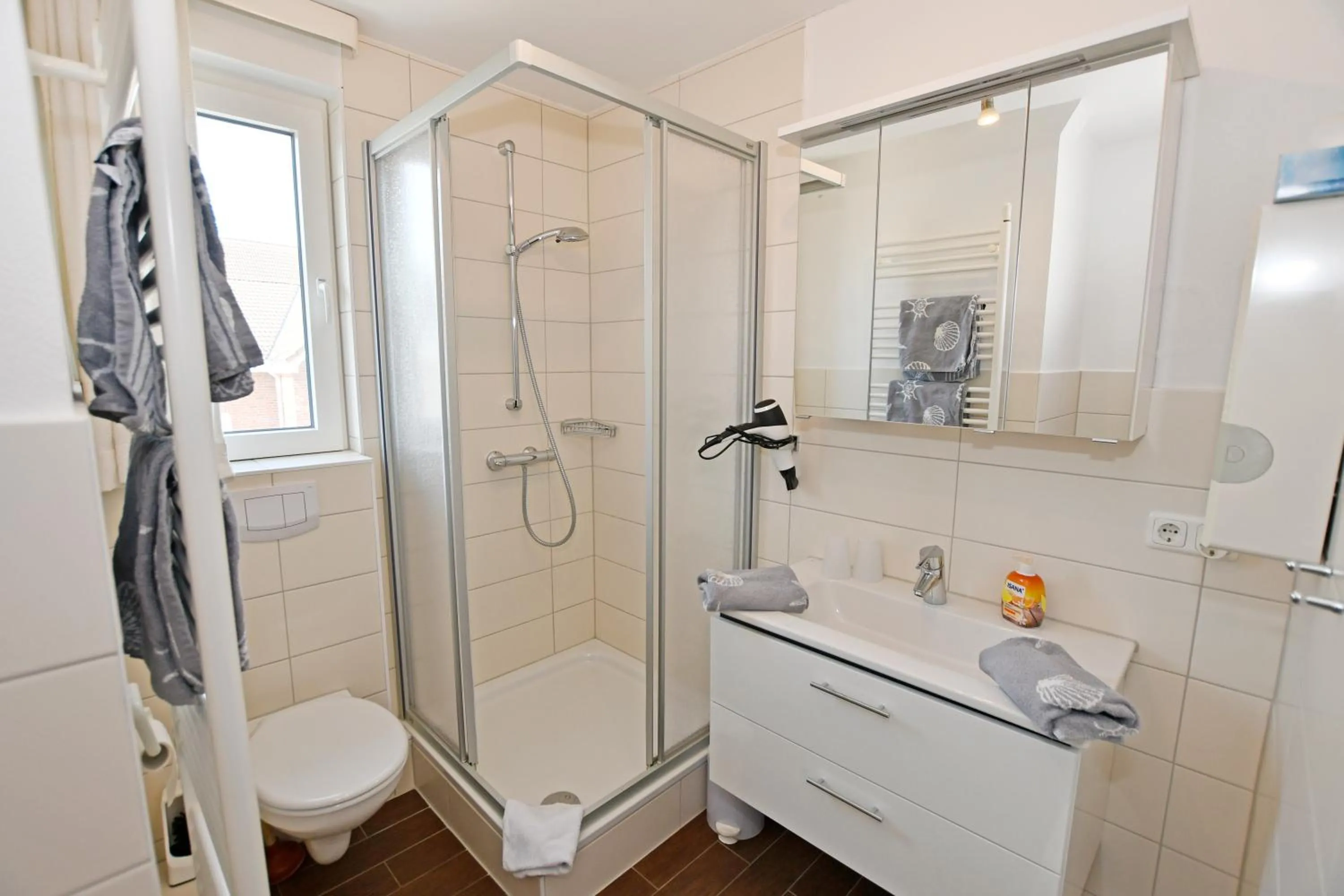 Bathroom in Ferienwohnung NORDIA Allee und See