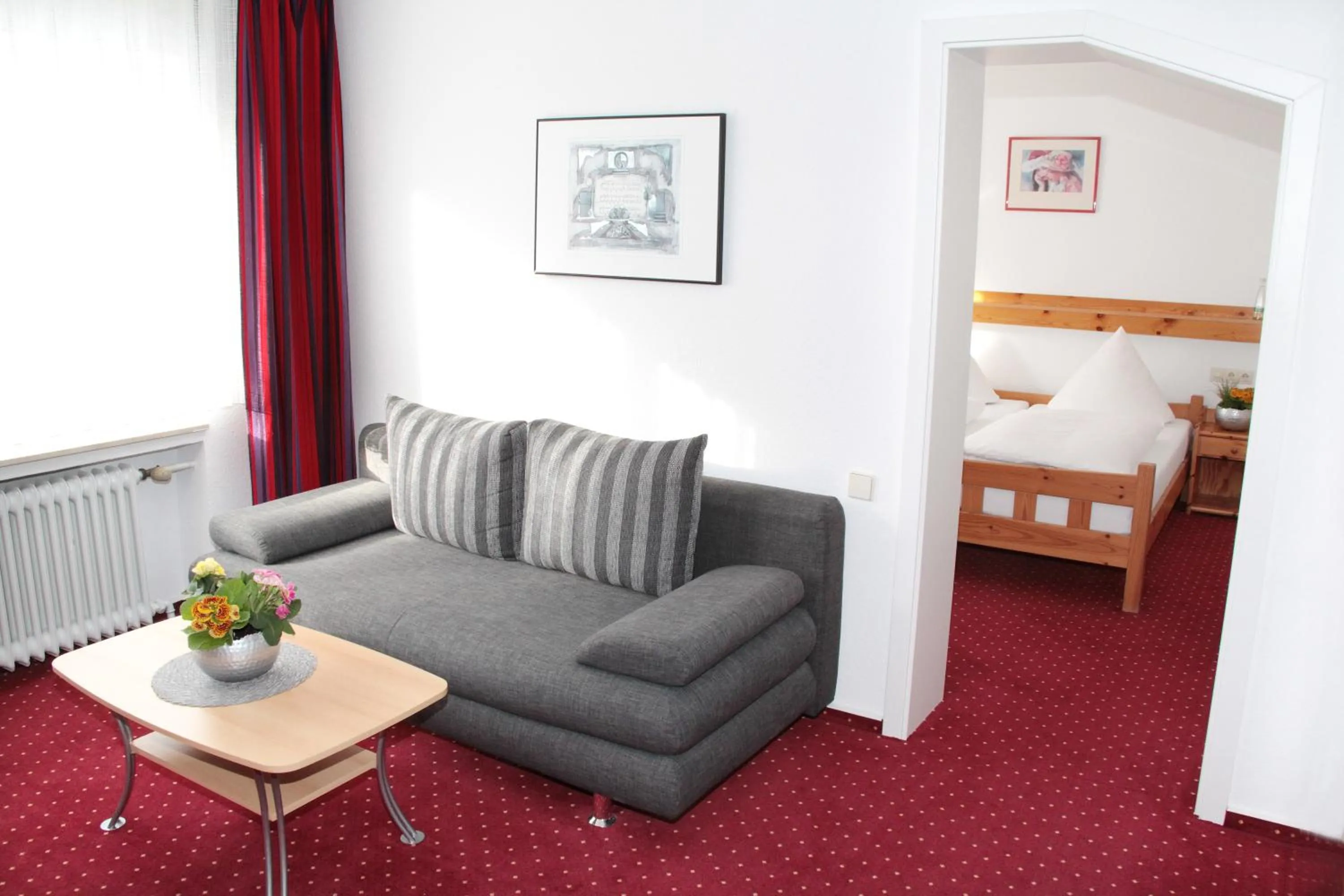 Photo of the whole room, Bed in Hotel an der Sonne & Restaurant Zum Schneiger