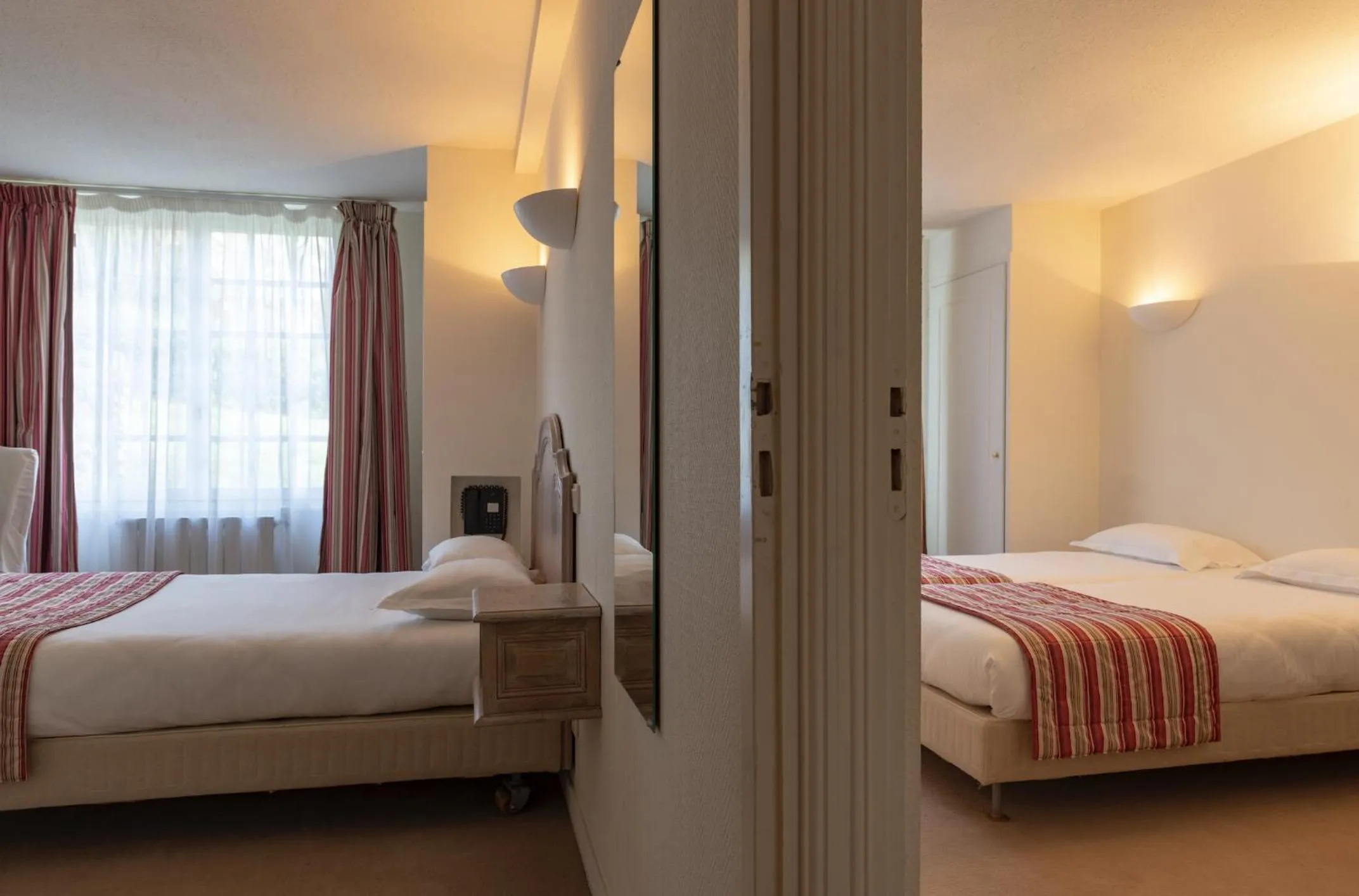 Bed in Hotel The Originals Château de Perigny