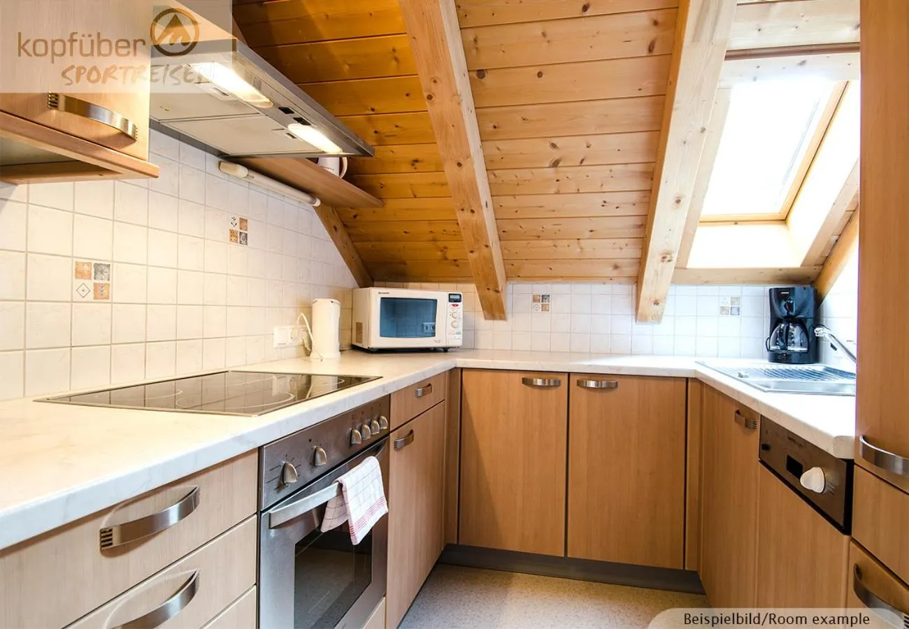 Kitchen or kitchenette in Sporthotel Daniel