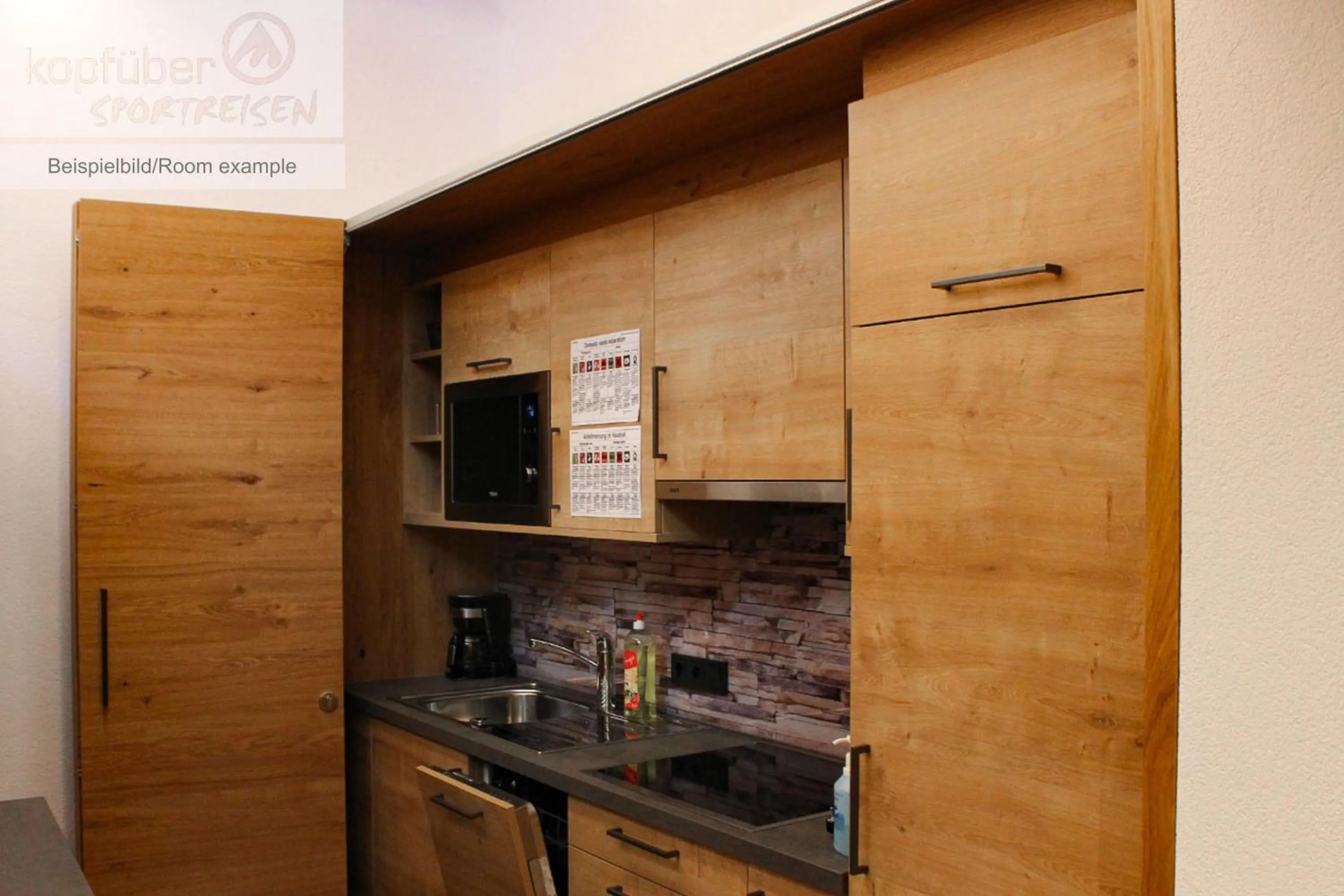 Kitchen or kitchenette in Sporthotel Daniel