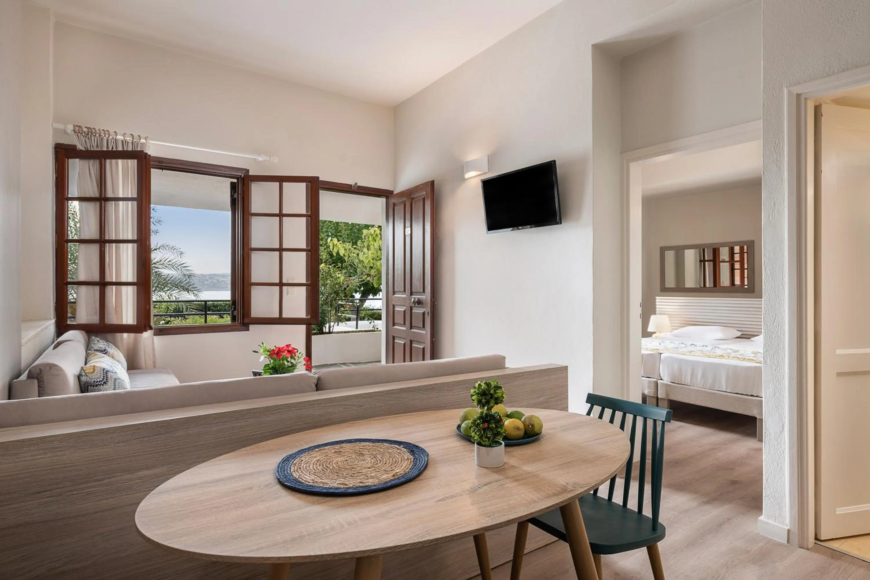Living room, Bed in Alianthos Suites