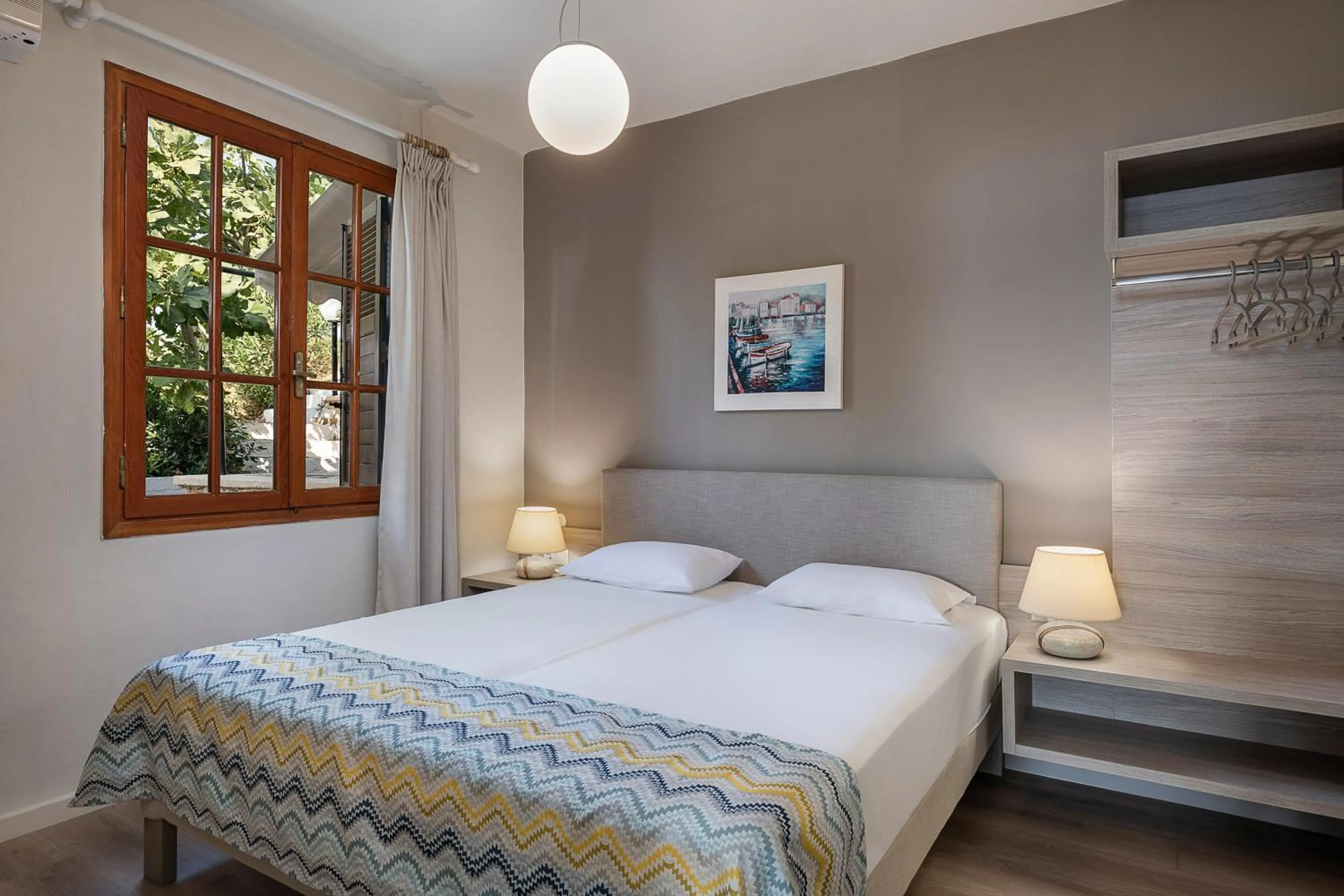 Bed in Alianthos Suites