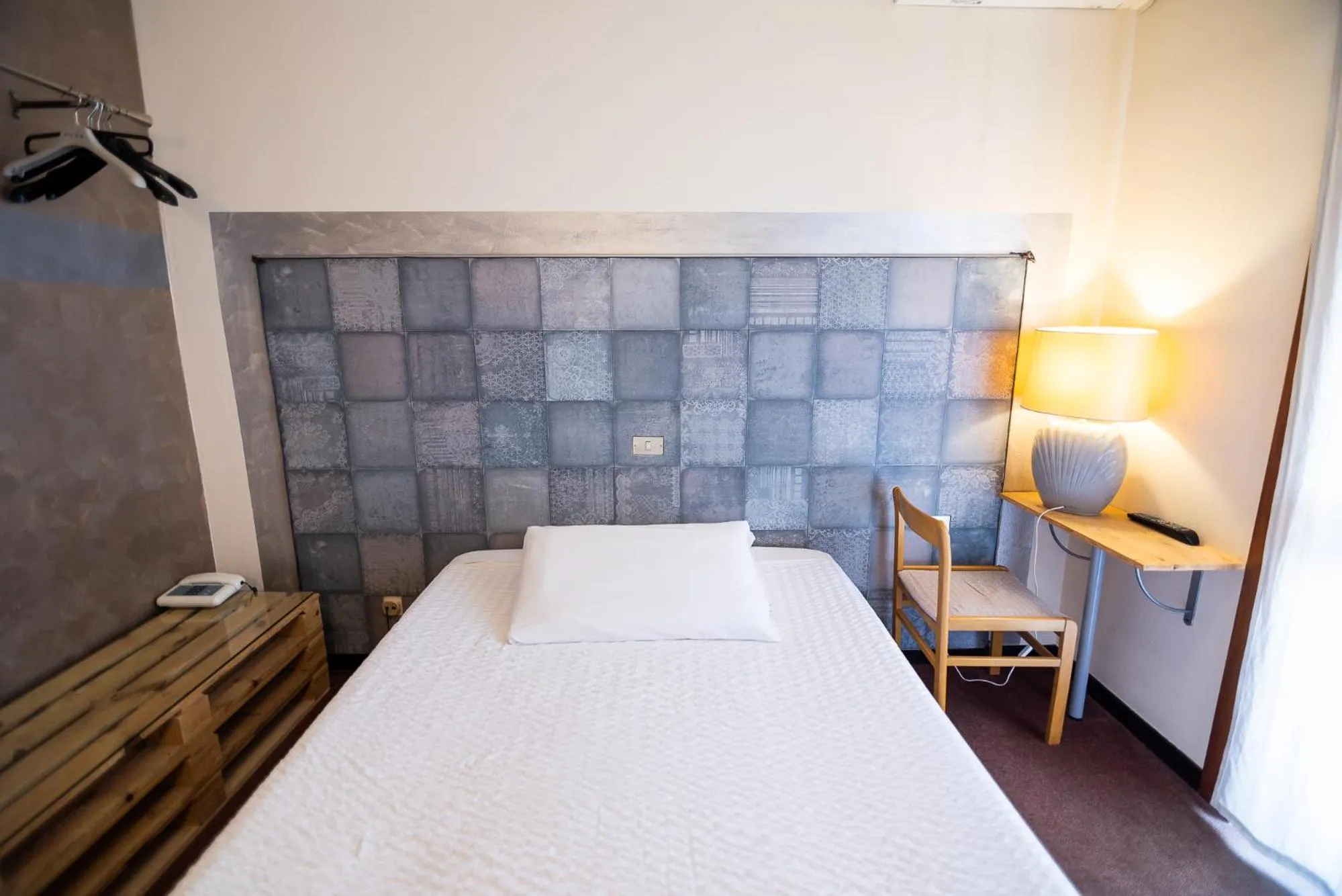 Bed in Hotel Rendez Vous