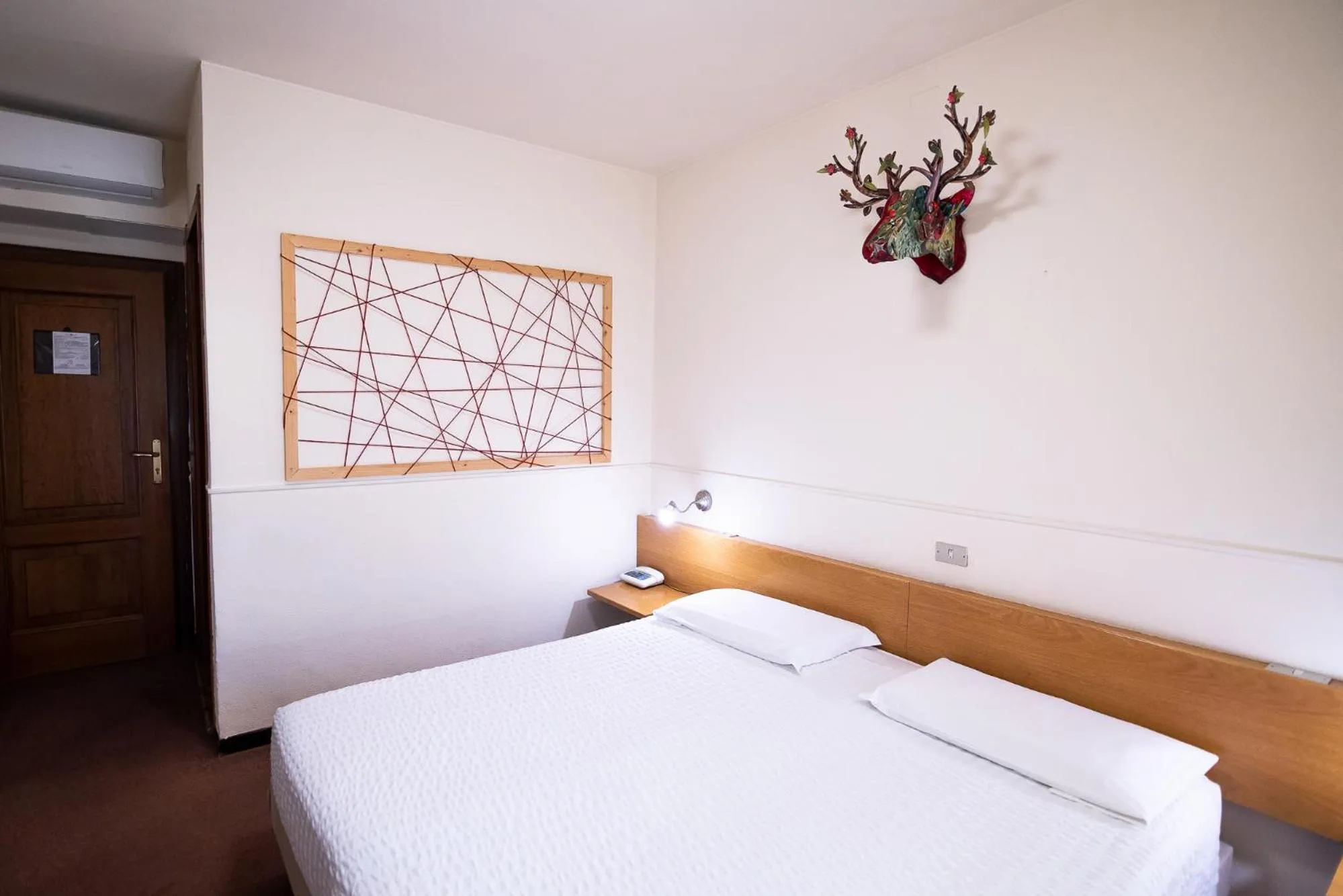 Bed in Hotel Rendez Vous