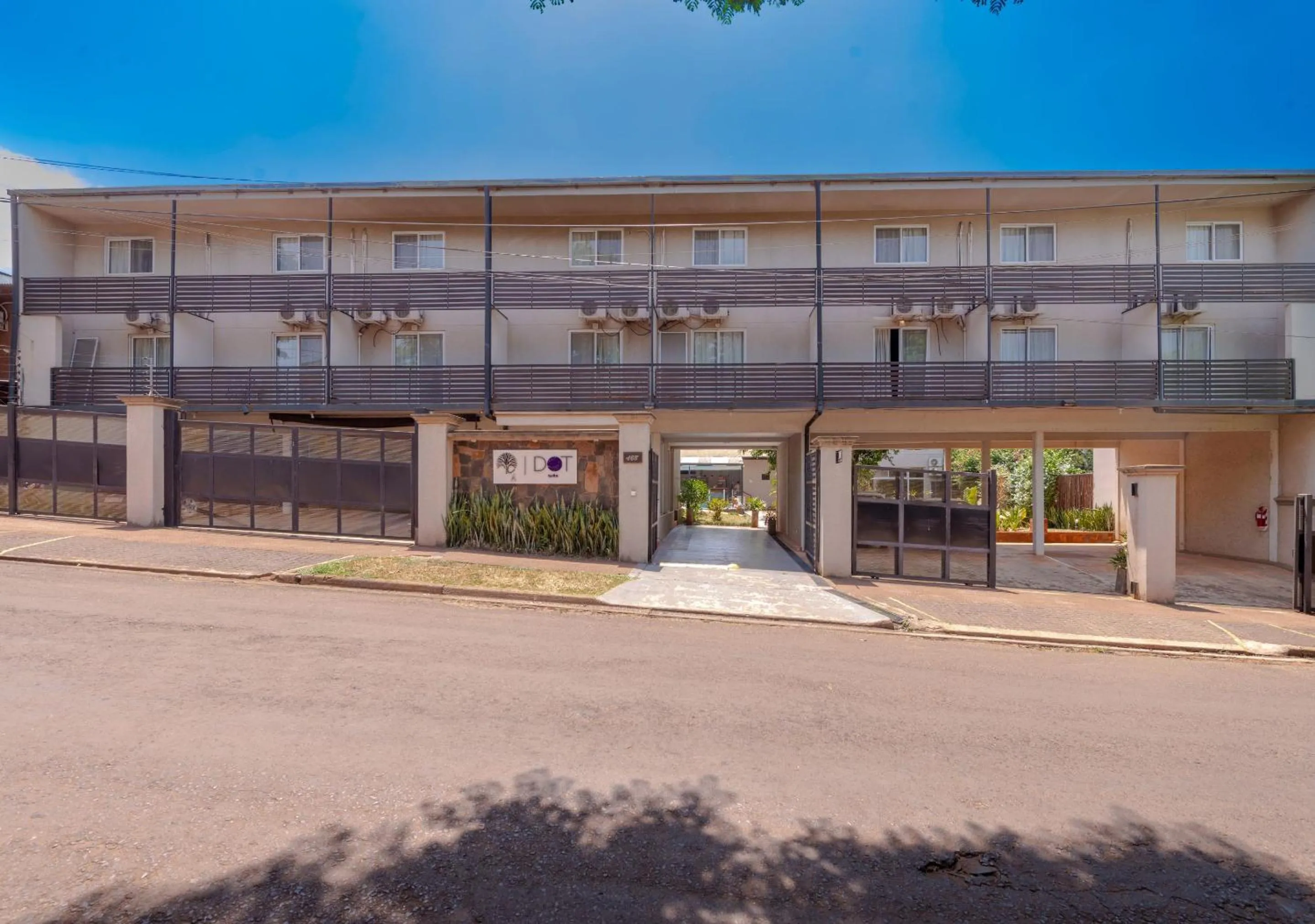 Property building in INGA by DOT Suites