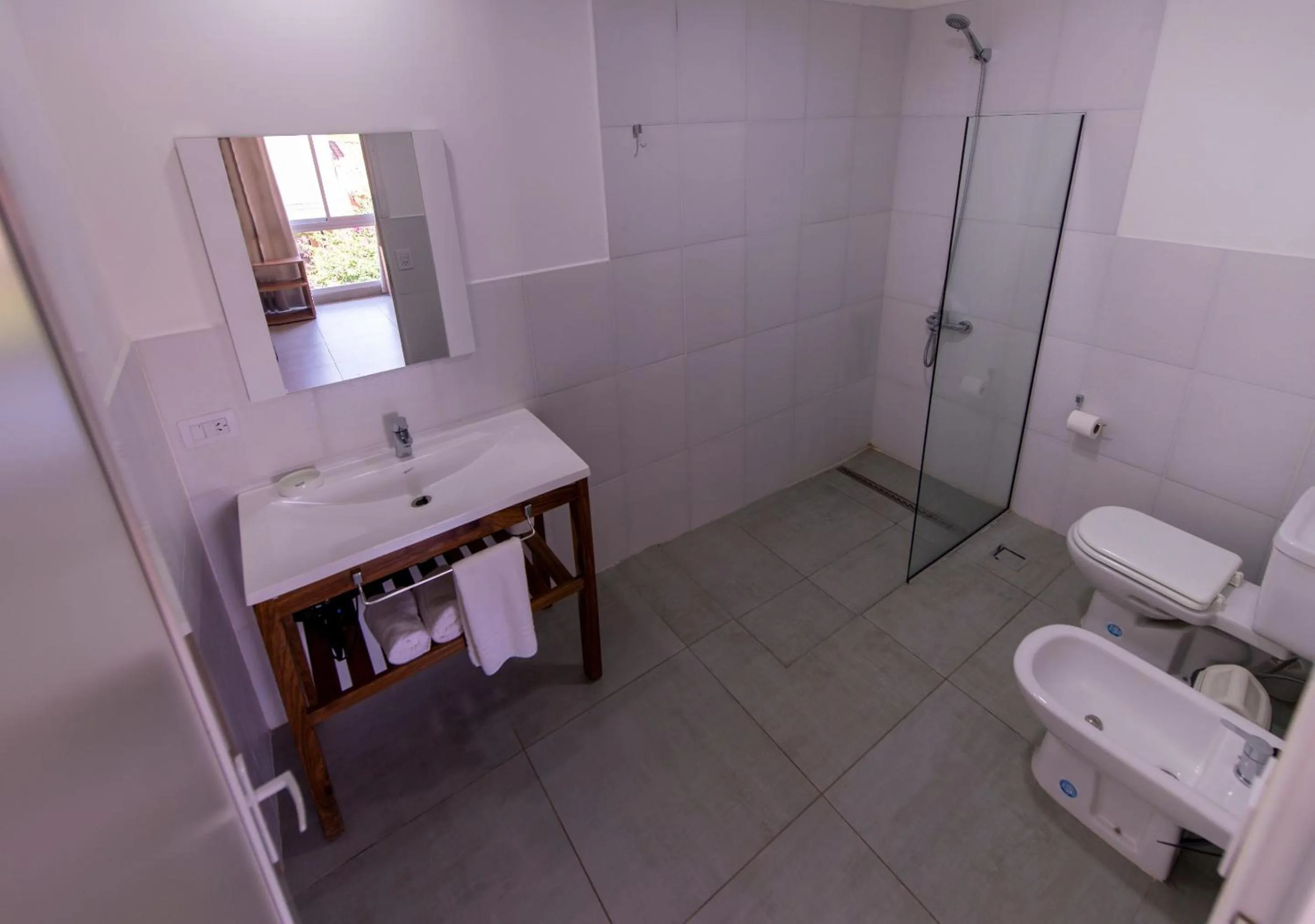 Shower in INGA by DOT Suites