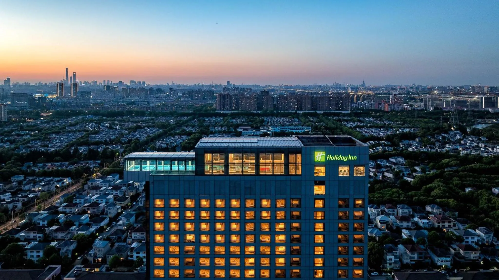 Property building in Holiday Inn Shanghai Pudong Kangqiao by IHG - Free shuttle bus to Disney land, Ins Swimming Pool