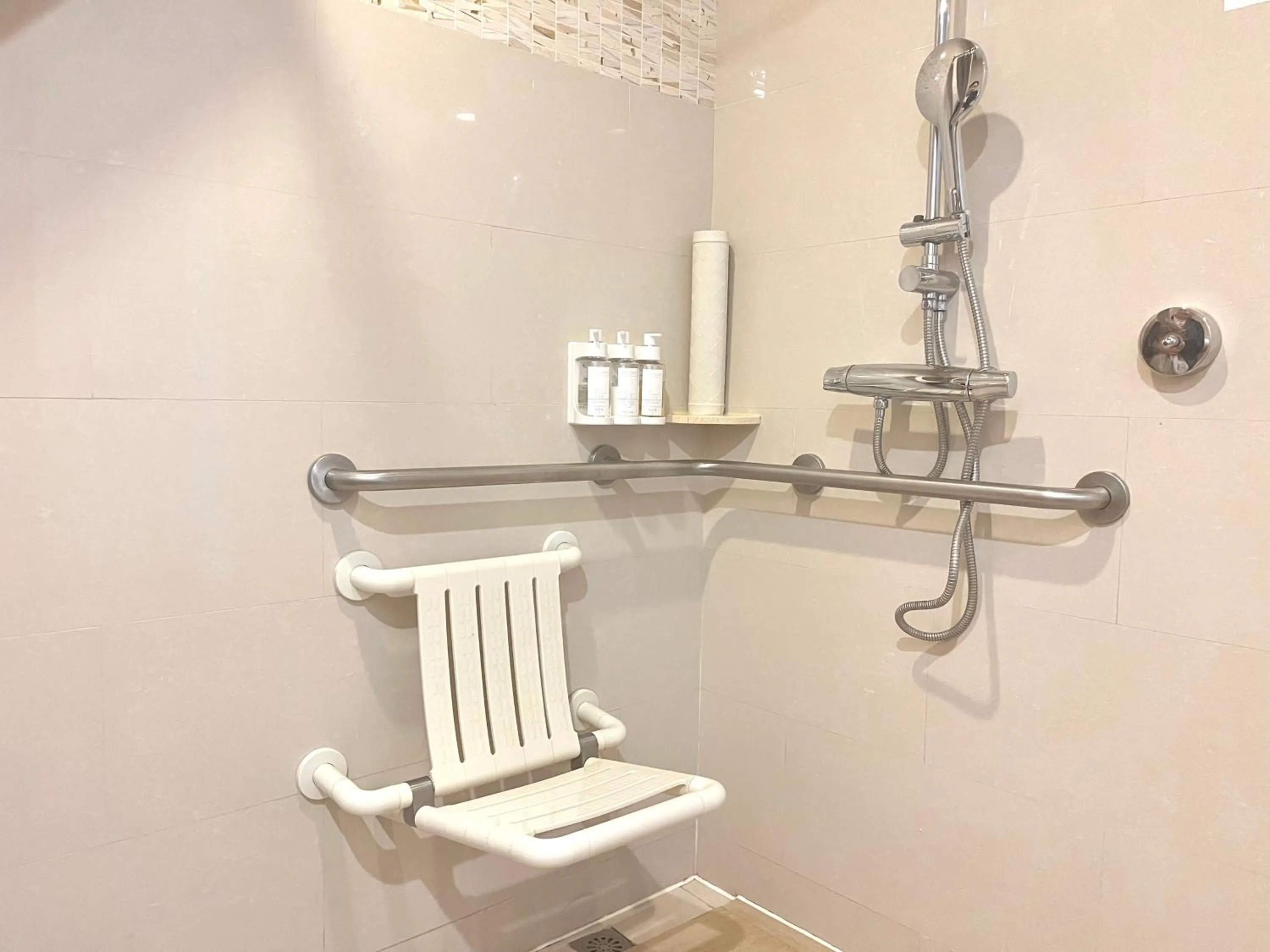 Bathroom in Holiday Inn Shanghai Pudong Kangqiao by IHG - Free shuttle bus to Disney land, Ins Swimming Pool