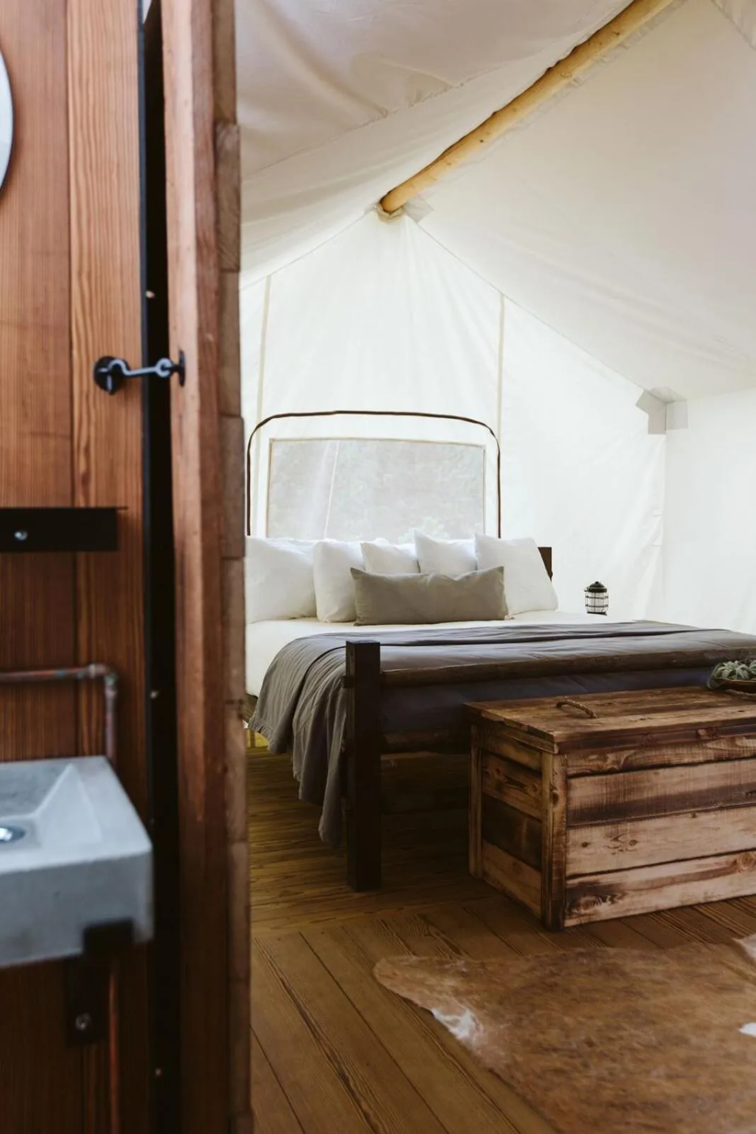 Bed in Under Canvas Mount Rushmore