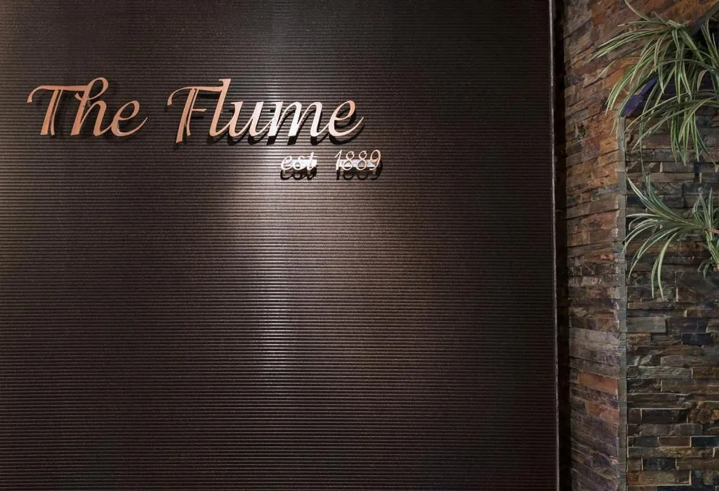 Property logo or sign in Stevens Inn a Howard Johnson by Wyndham