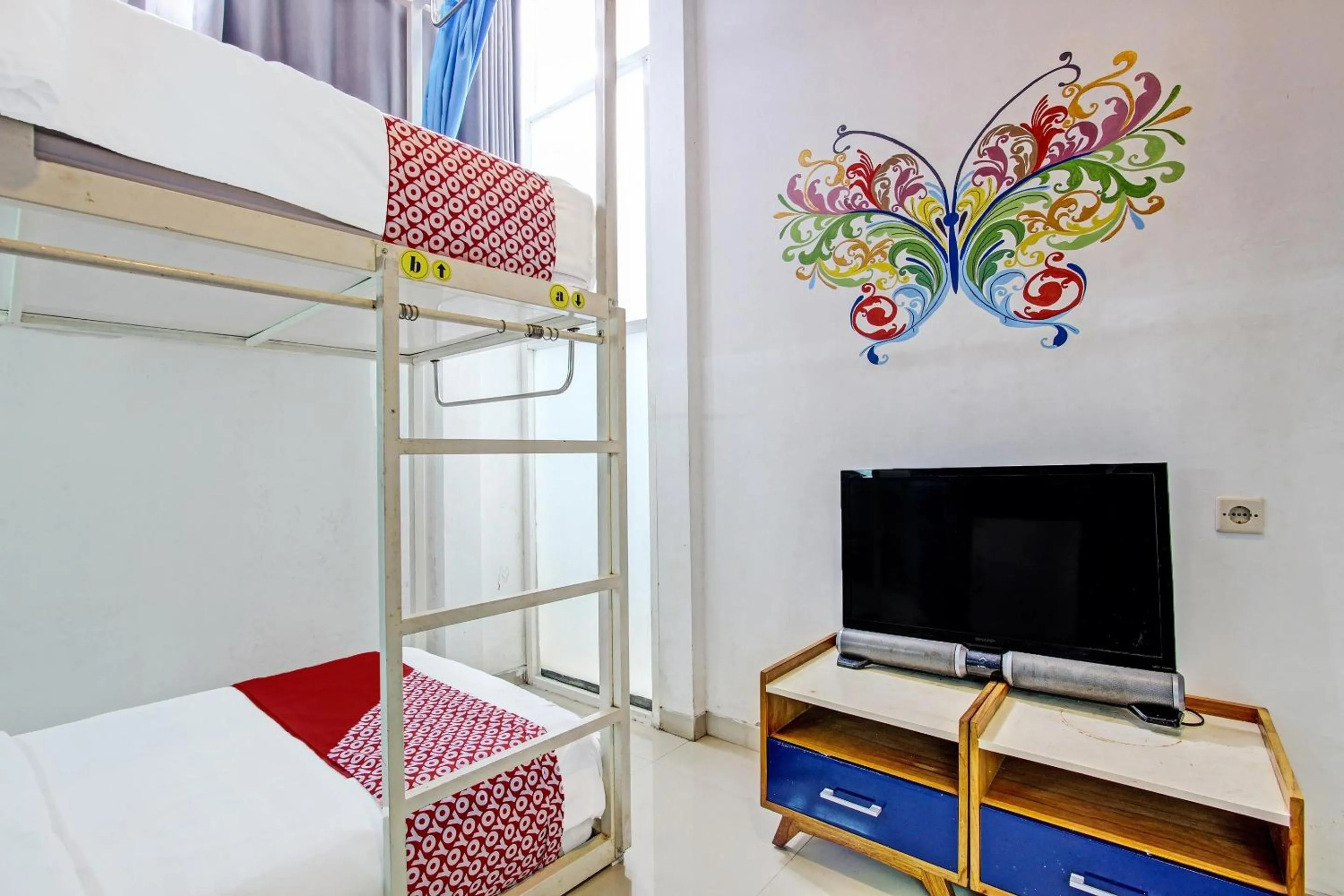 Bedroom in OYO 91952 Oase Hostel