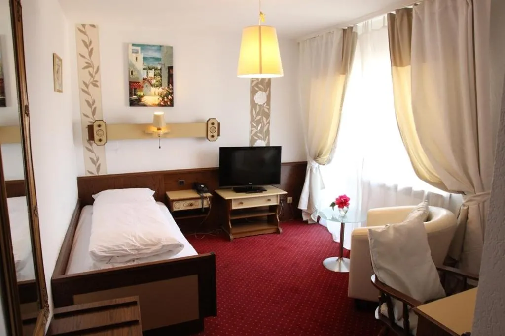 Photo of the whole room, Bed in Kurhotel Würdinger Hof