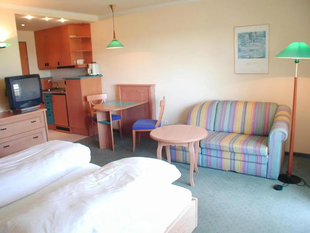 Photo of the whole room, Bed in Kurhotel Würdinger Hof