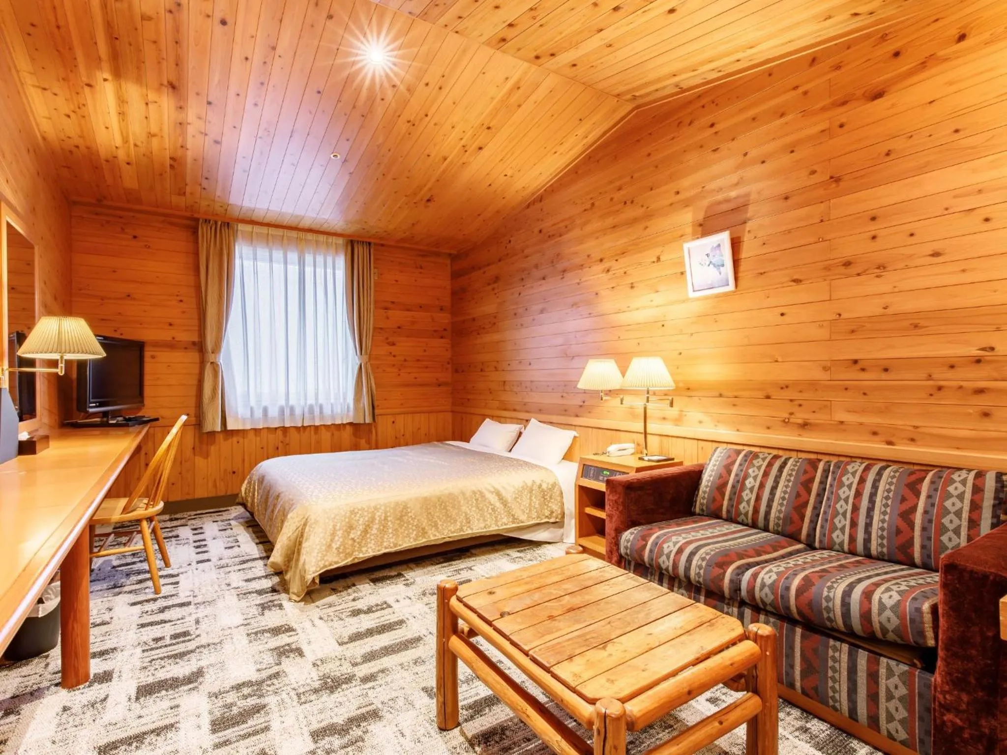 Photo of the whole room, Bed in Kibi Kogen Resort Hotel