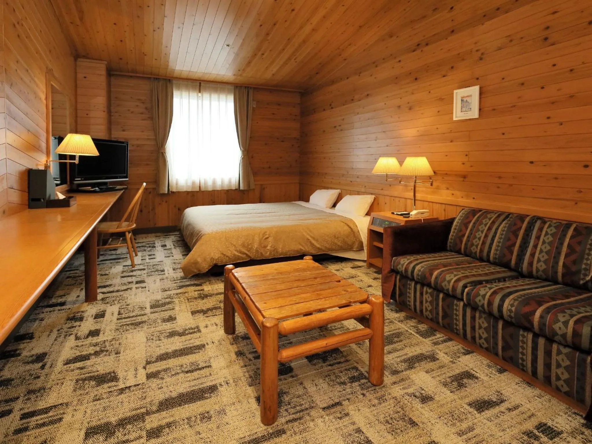 Photo of the whole room, Bed in Kibi Kogen Resort Hotel