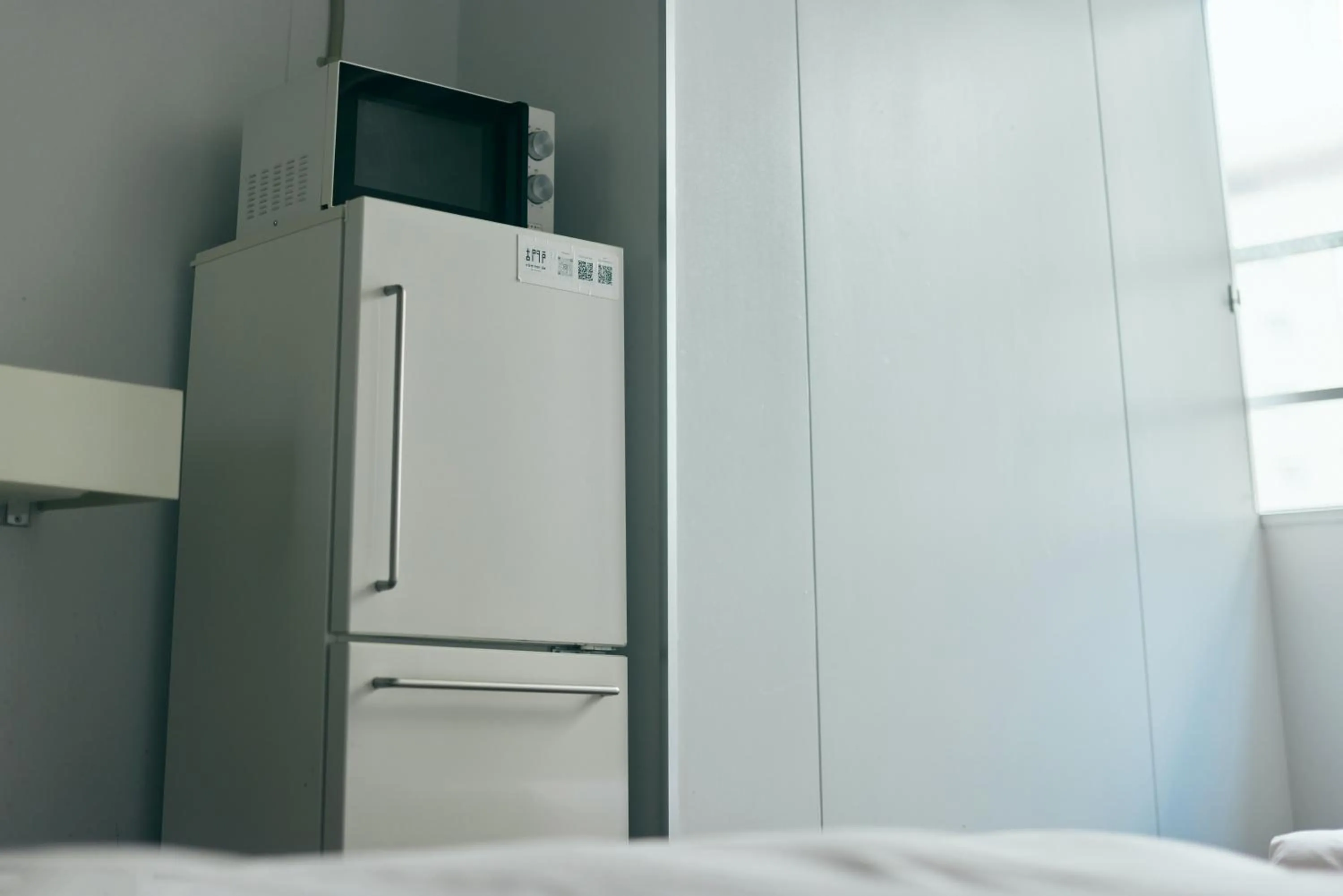 Kitchen or kitchenette in Common de - Hostel & Bar