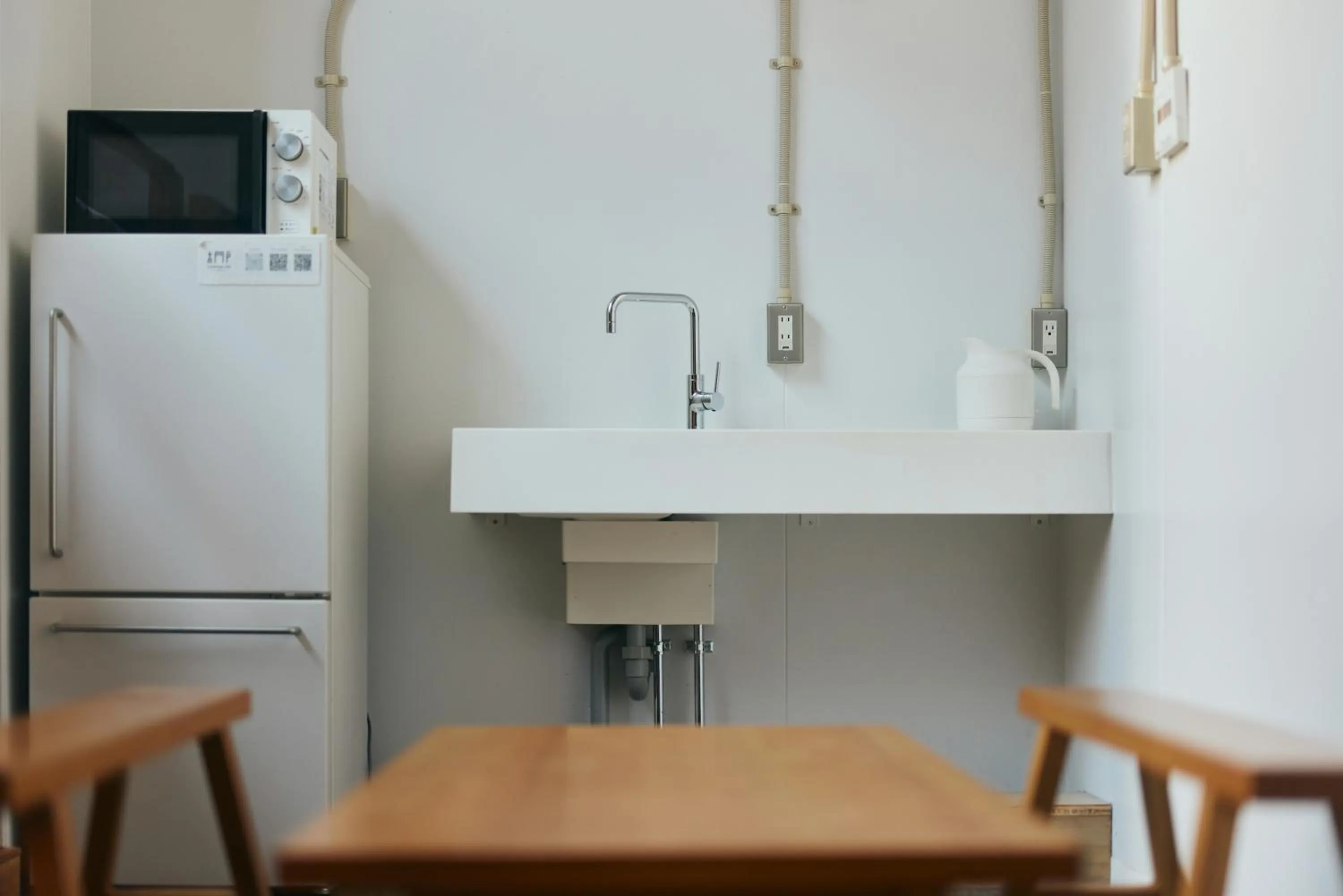 Kitchen or kitchenette in Common de - Hostel & Bar