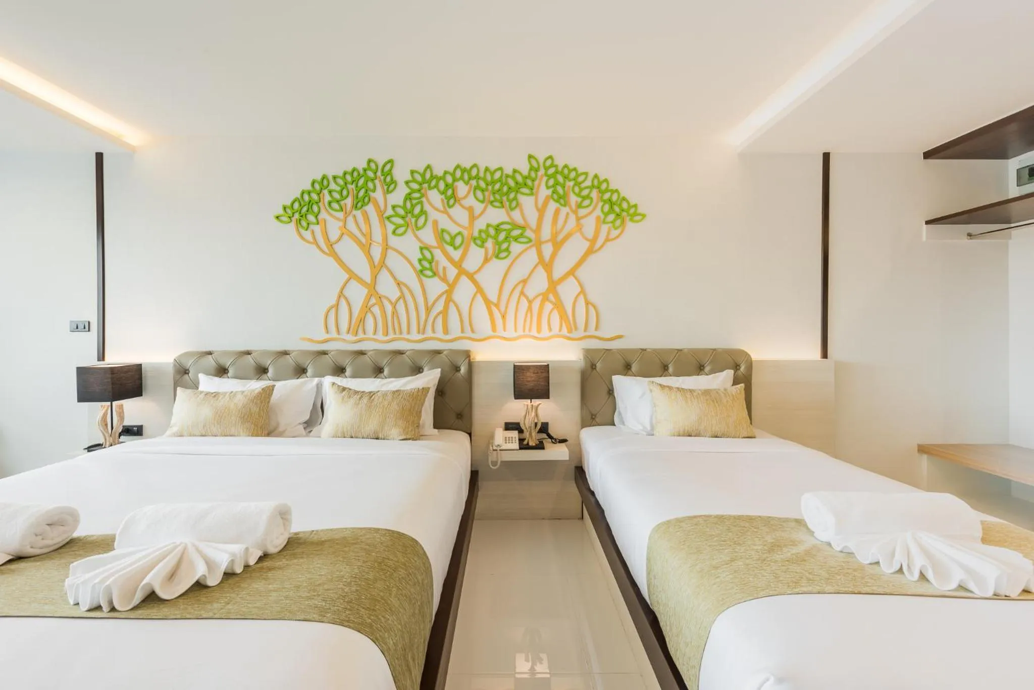 Bed in River Front Krabi Hotel