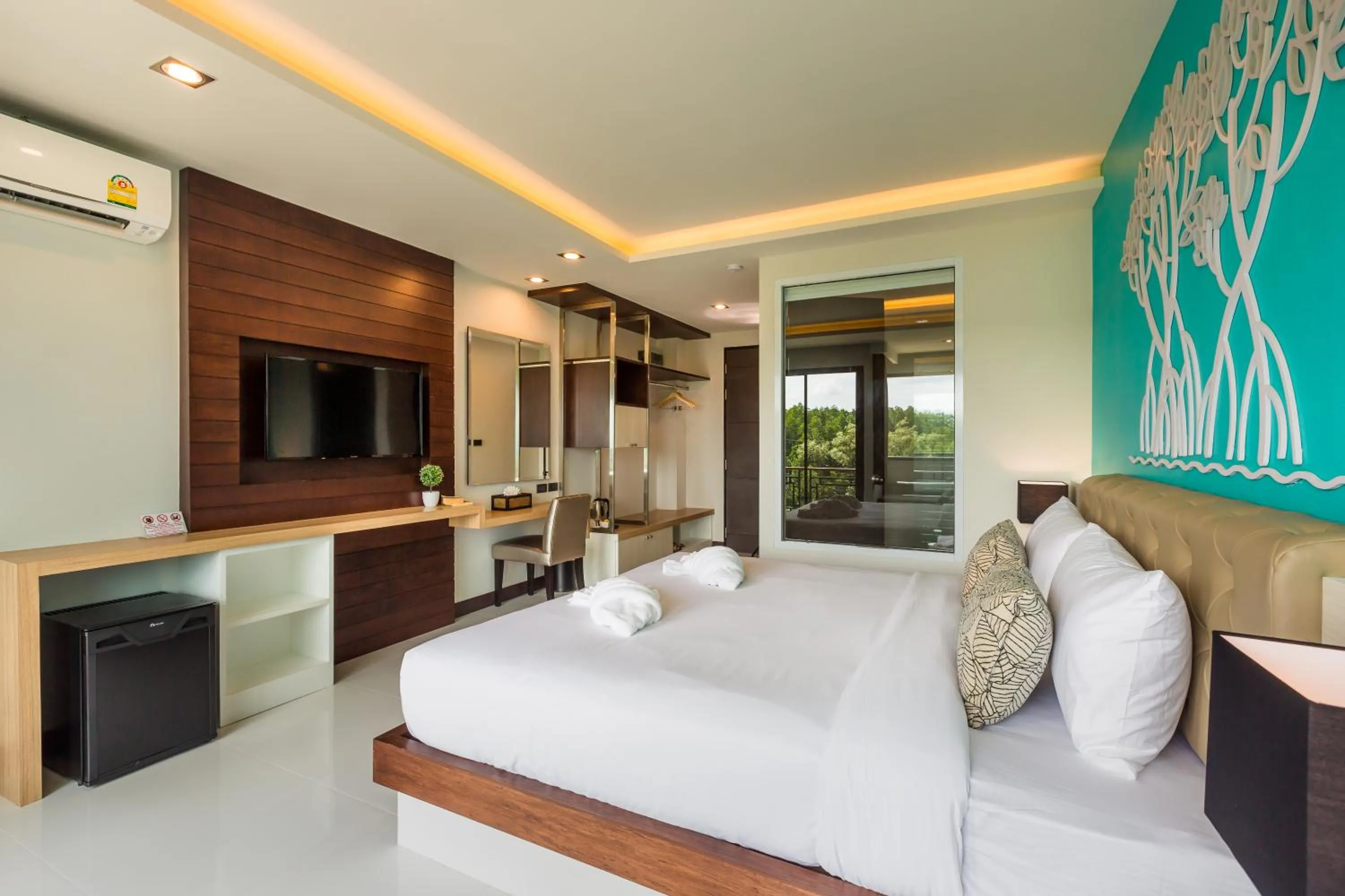 Bed in River Front Krabi Hotel