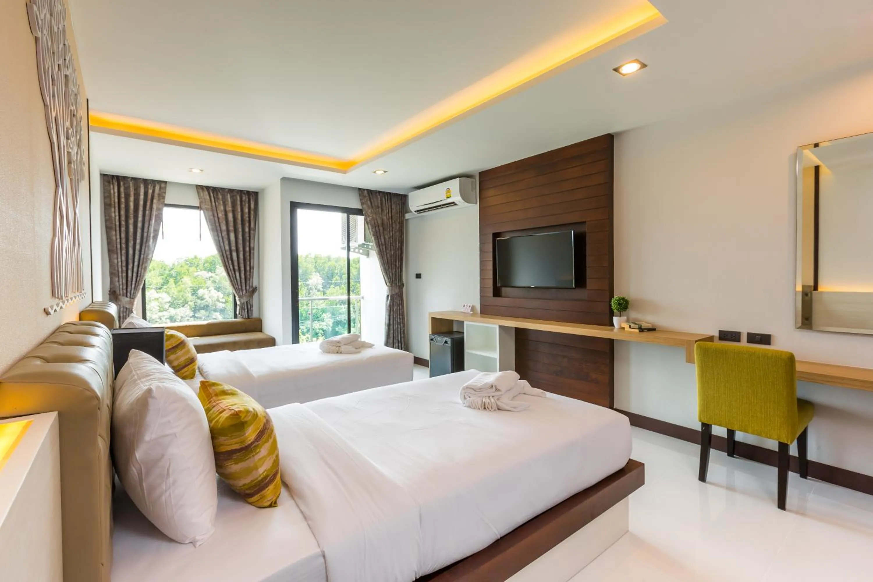 Bed in River Front Krabi Hotel