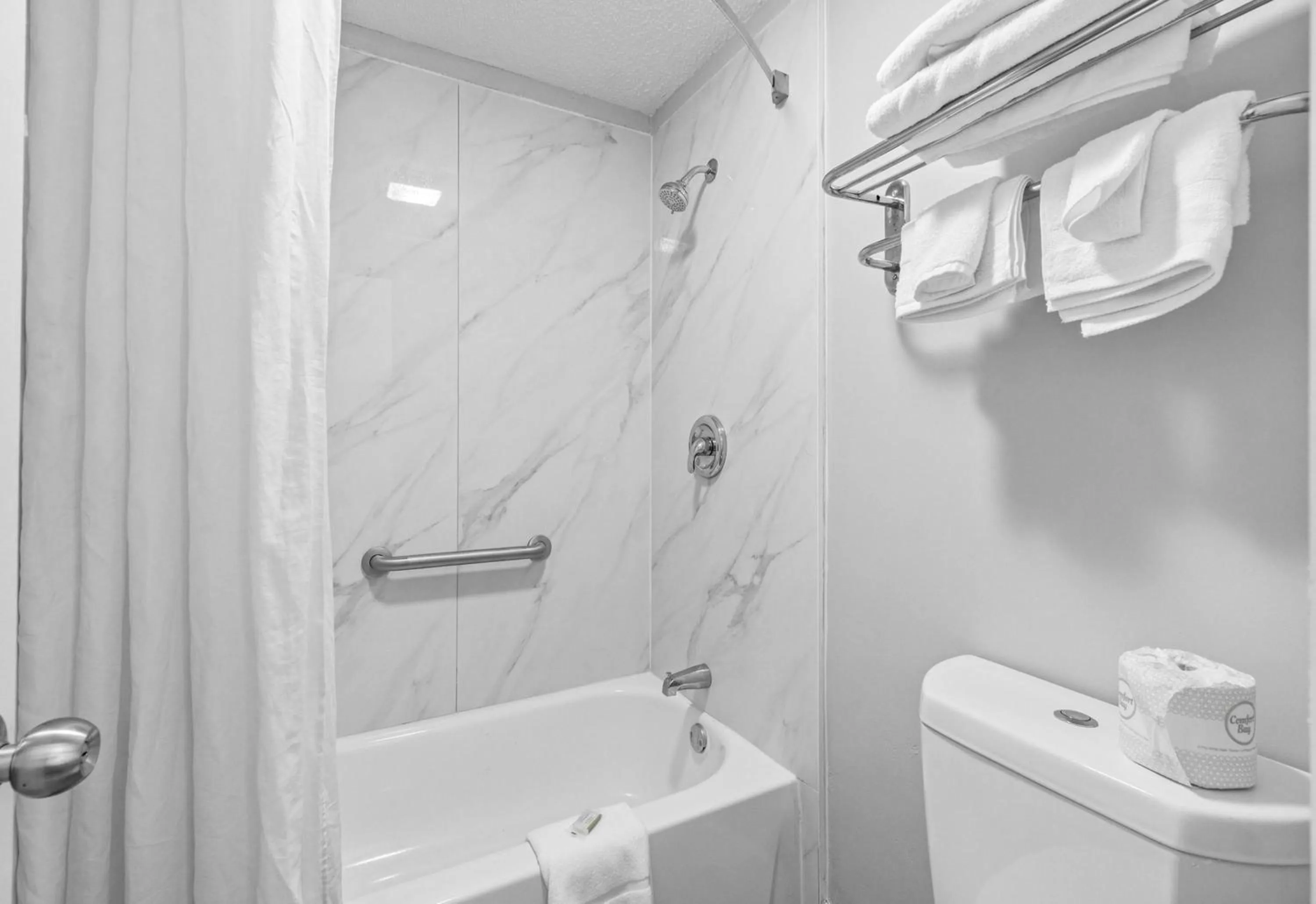 Bathroom in Super 8 by Wyndham Lantana West Palm Beach