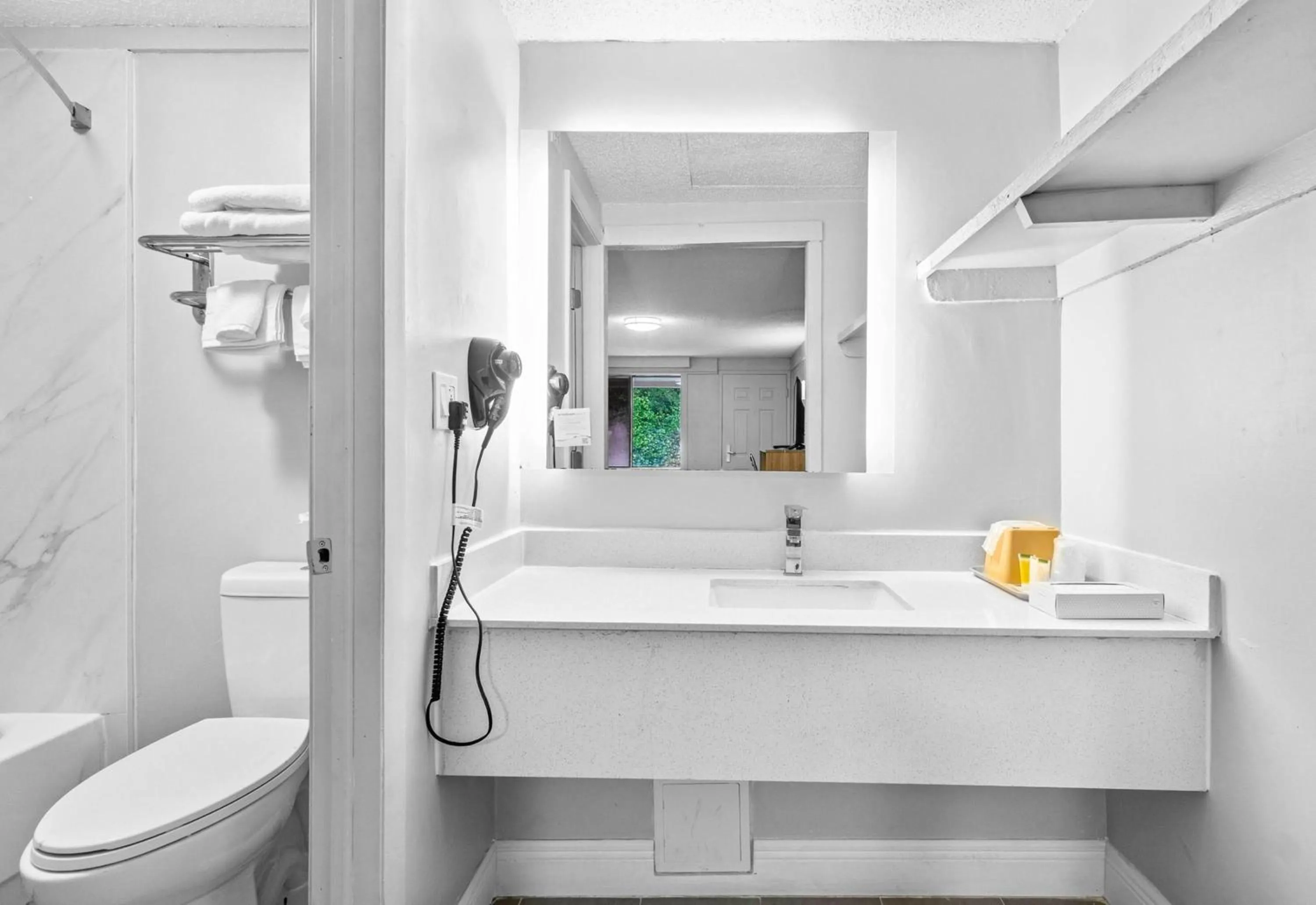 Bathroom in Super 8 by Wyndham Lantana West Palm Beach