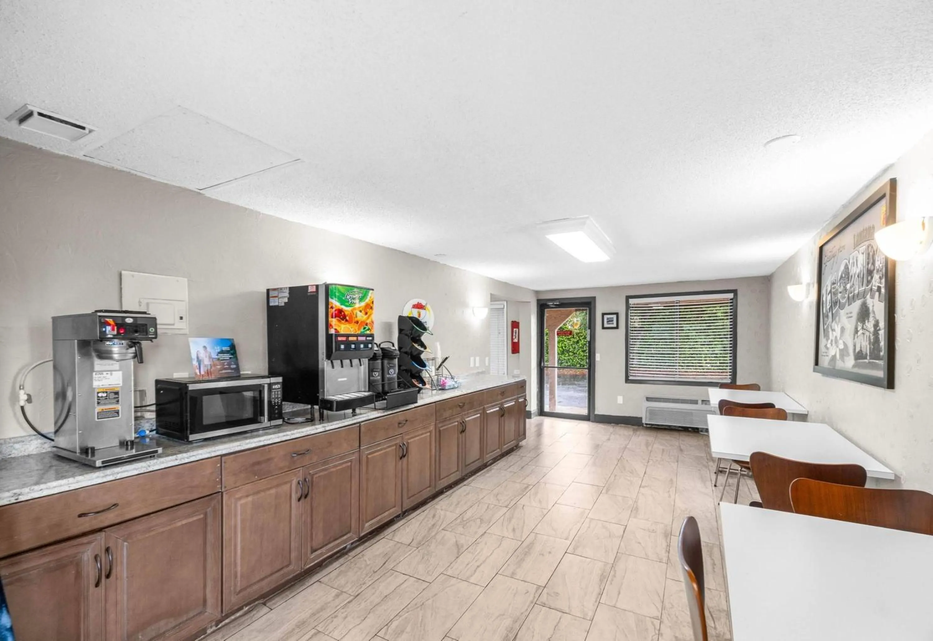 Property building in Super 8 by Wyndham Lantana West Palm Beach