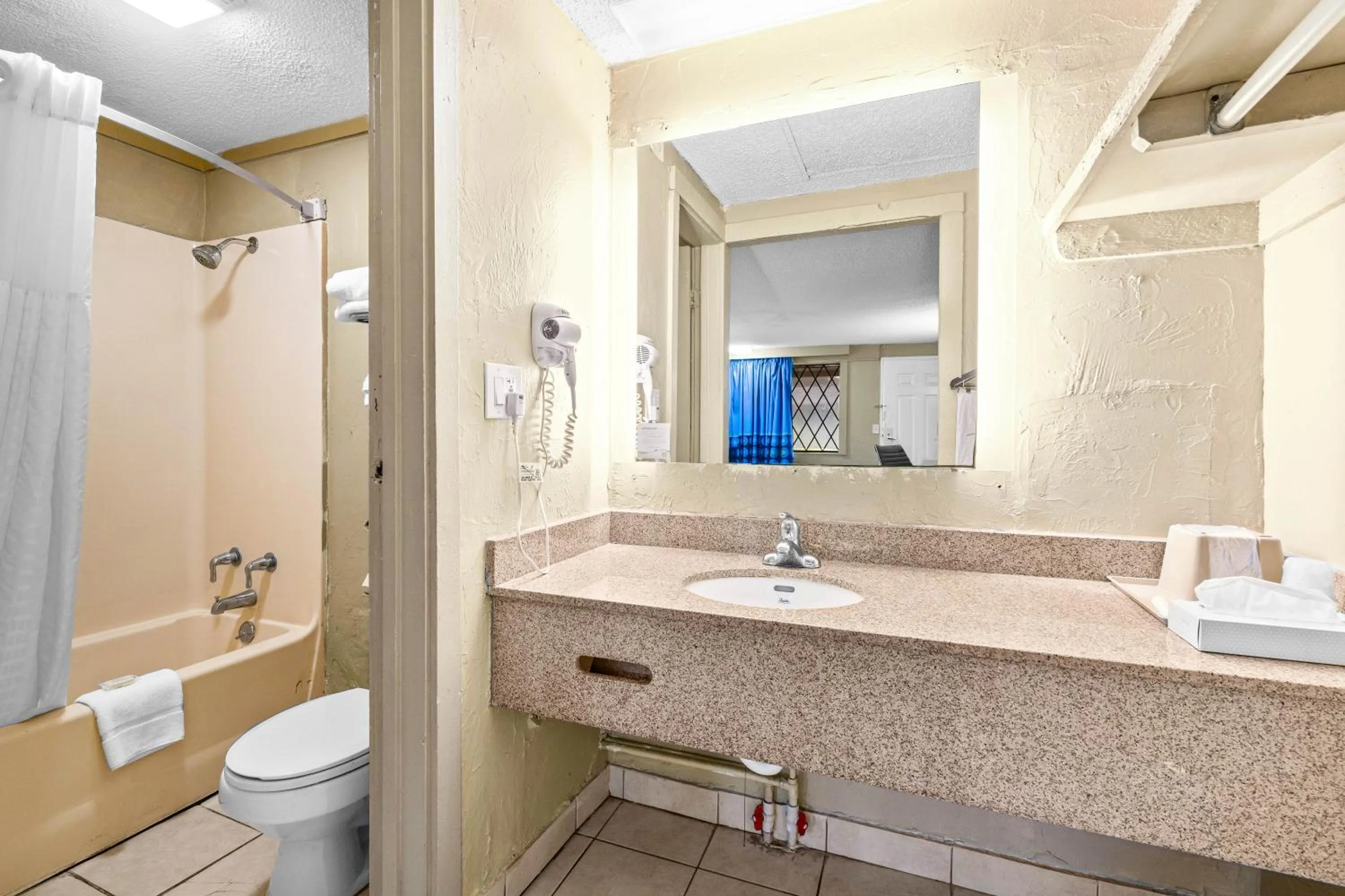 Bathroom in Super 8 by Wyndham Lantana West Palm Beach
